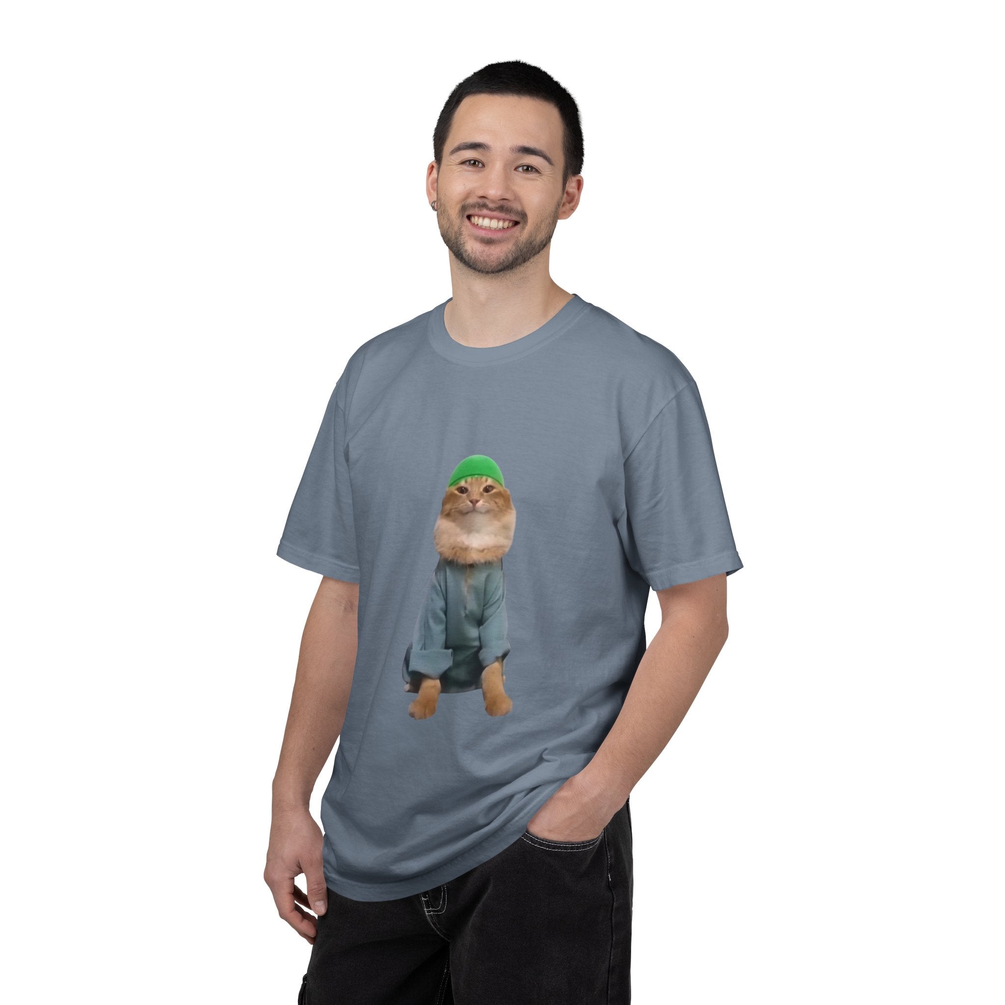 Man wearing a gray t-shirt with a graphic of a cat in a sweater and hat on a white background