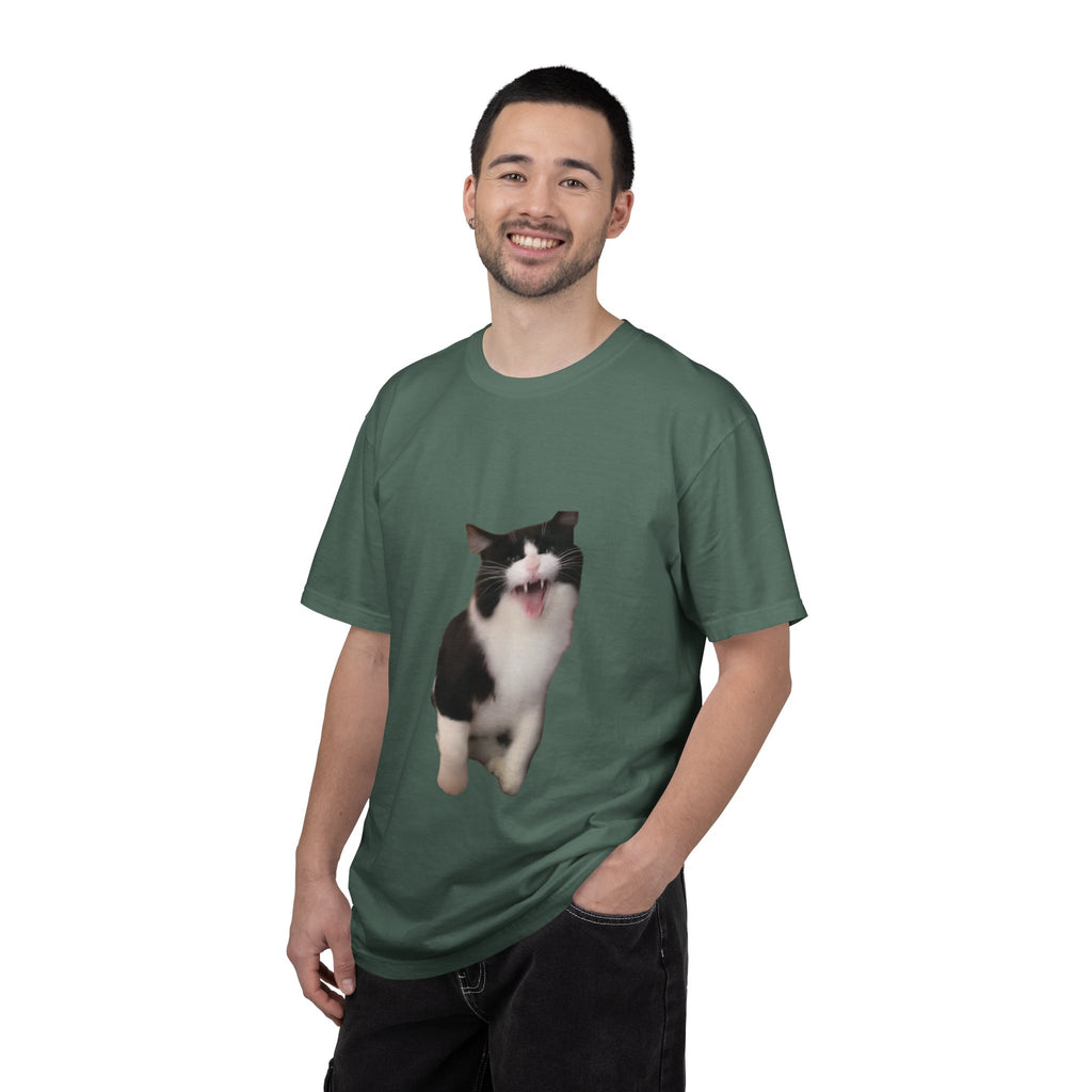 Man wearing a green t-shirt with a cat graphic on a white background