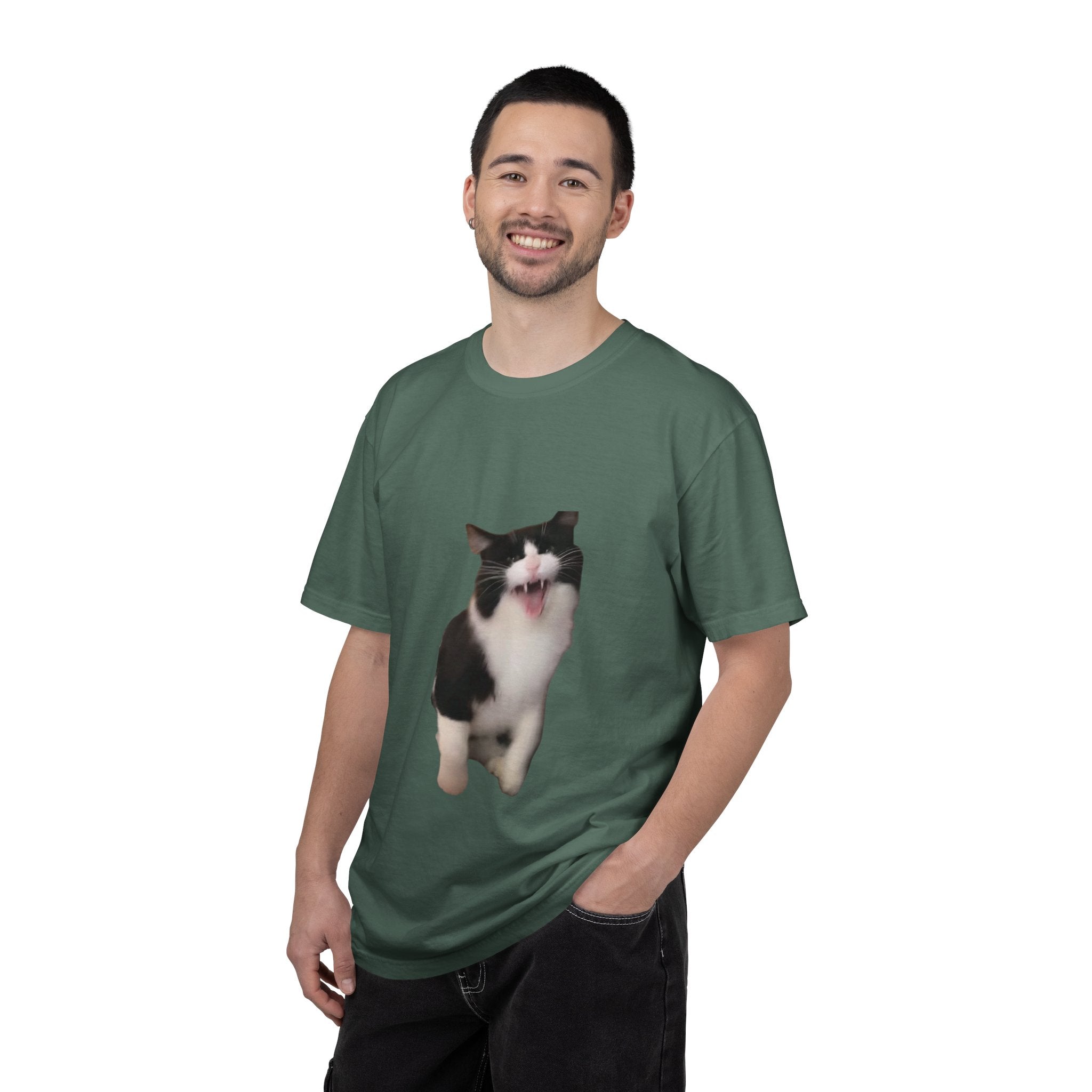 Man wearing a green t-shirt with a cat graphic on a white background