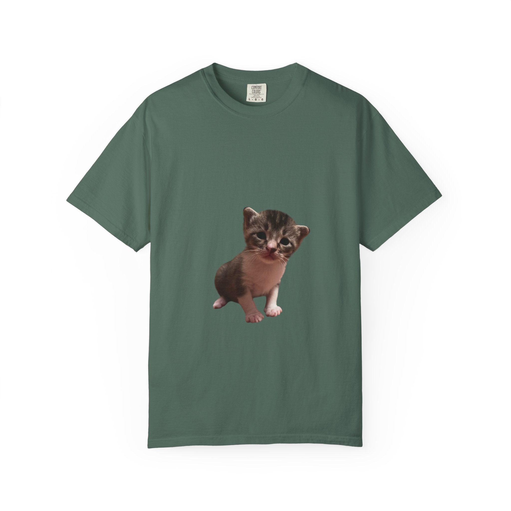 Green t-shirt with a kitten graphic on a white background
