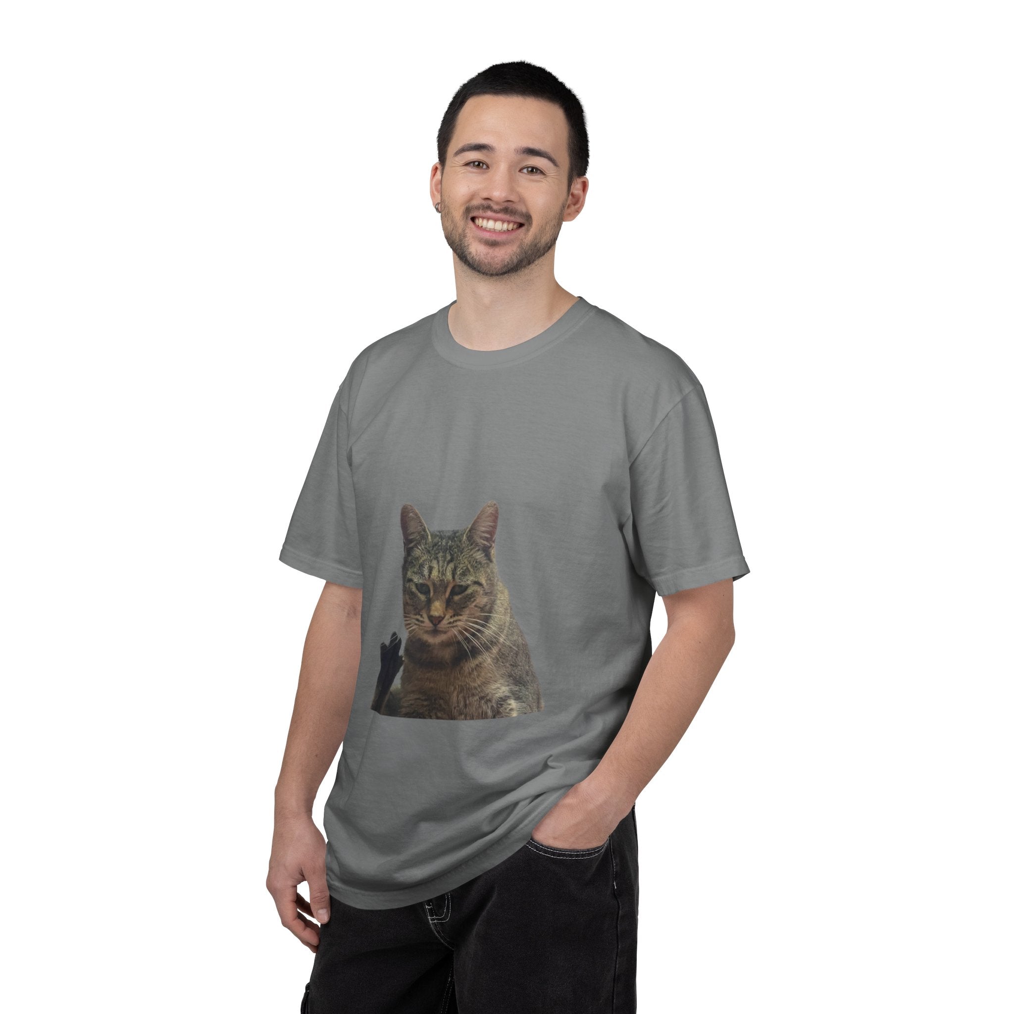 Man wearing a gray t-shirt with a cat graphic on a white background