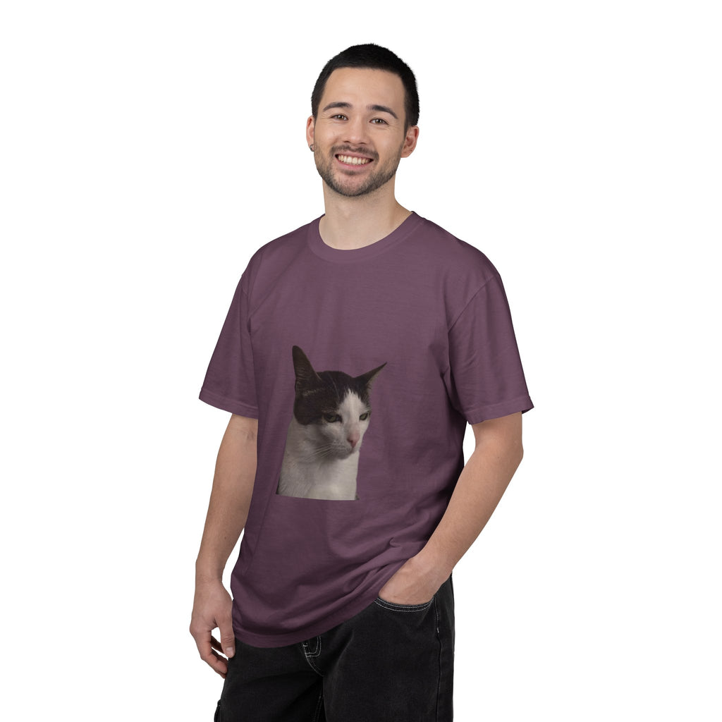 Man wearing a purple t-shirt with a cat graphic on a white background
