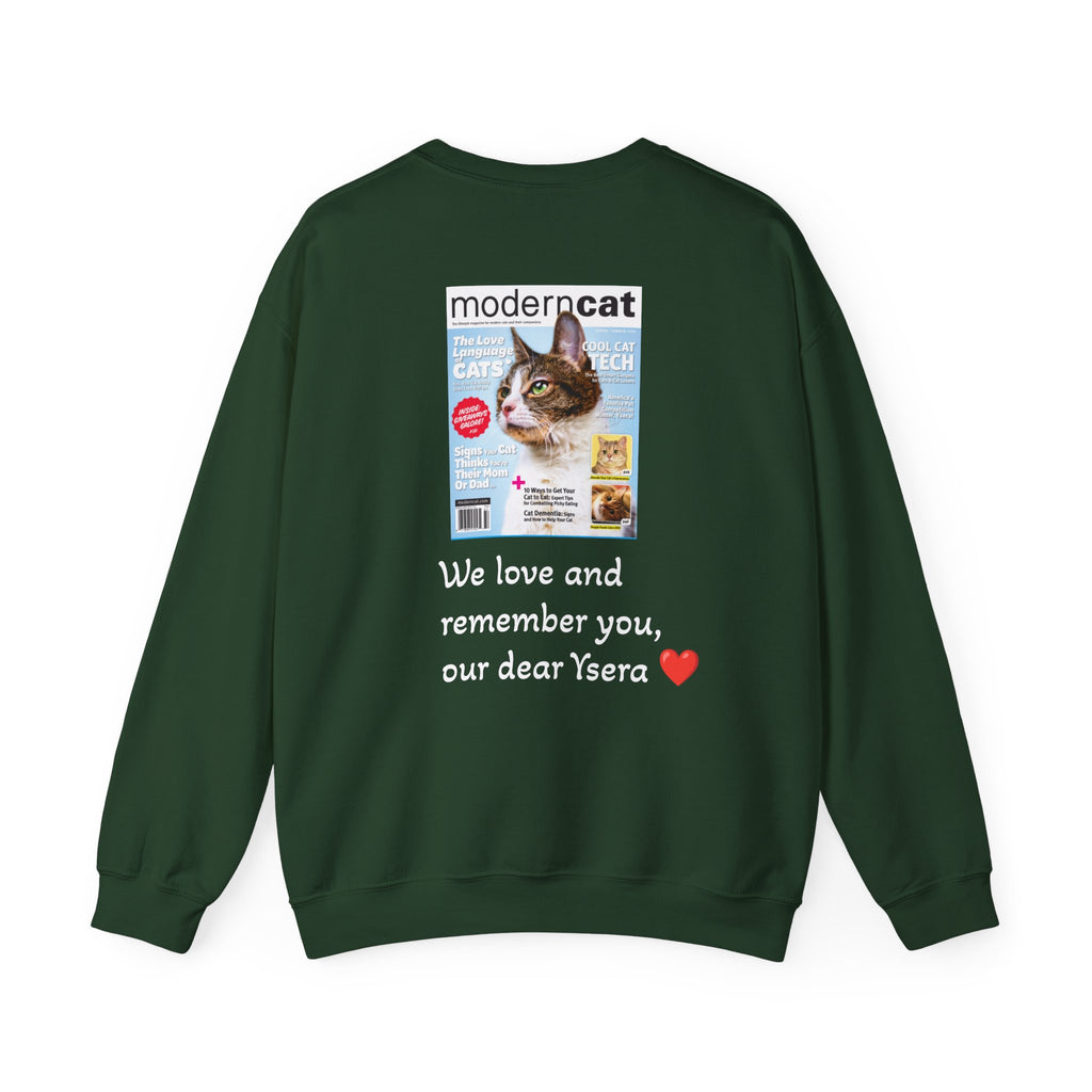 Green sweatshirt with a printed magazine cover and text on the back, on a white background