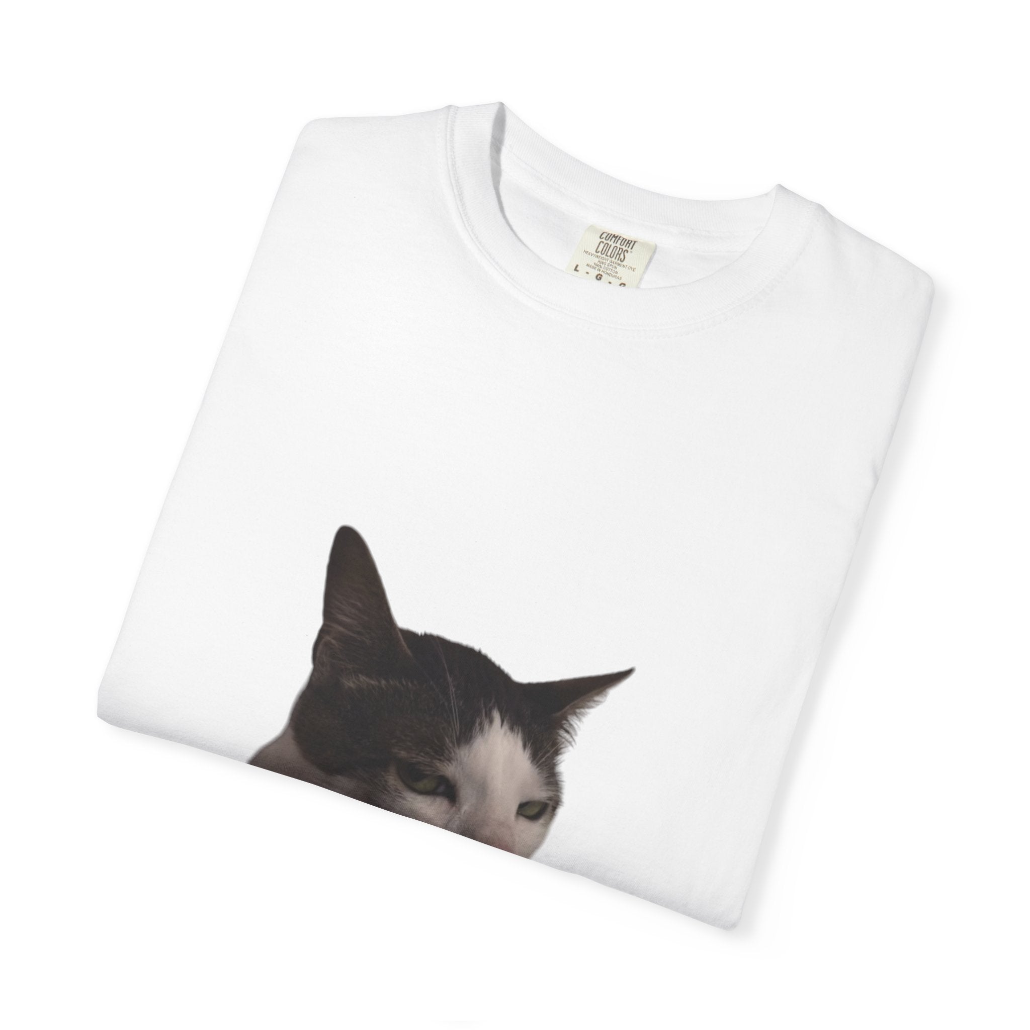 White t-shirt with a cat's face printed on it, displayed on a white background
