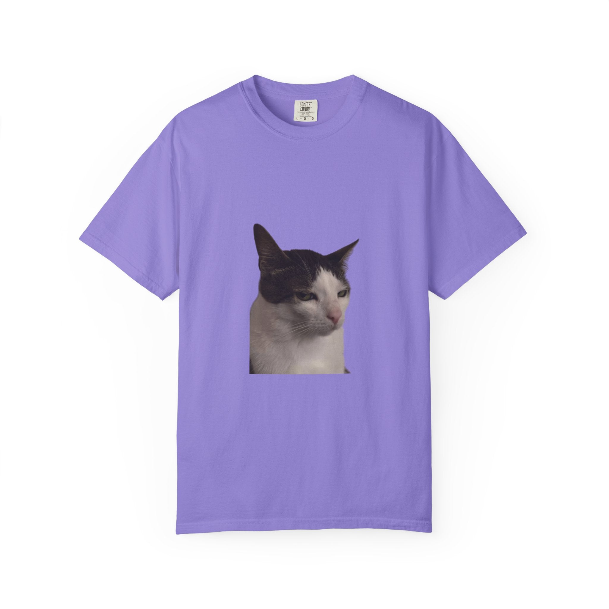 Purple t-shirt with a cat graphic on a white background