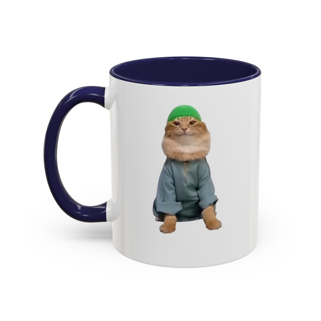 Mug with a cat wearing a green hat and gray outfit on a white background