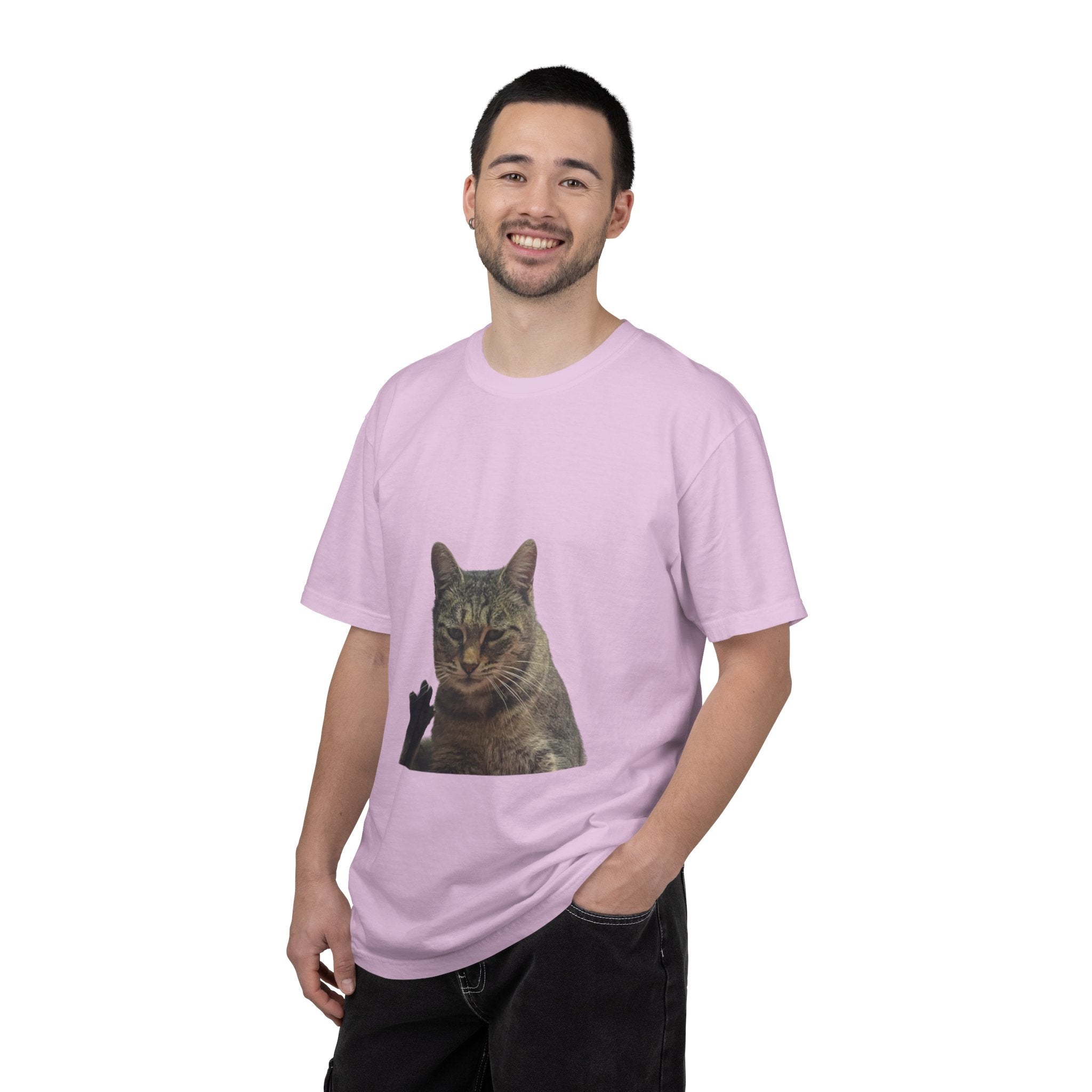 Man wearing a pink t-shirt with a cat graphic on a white background