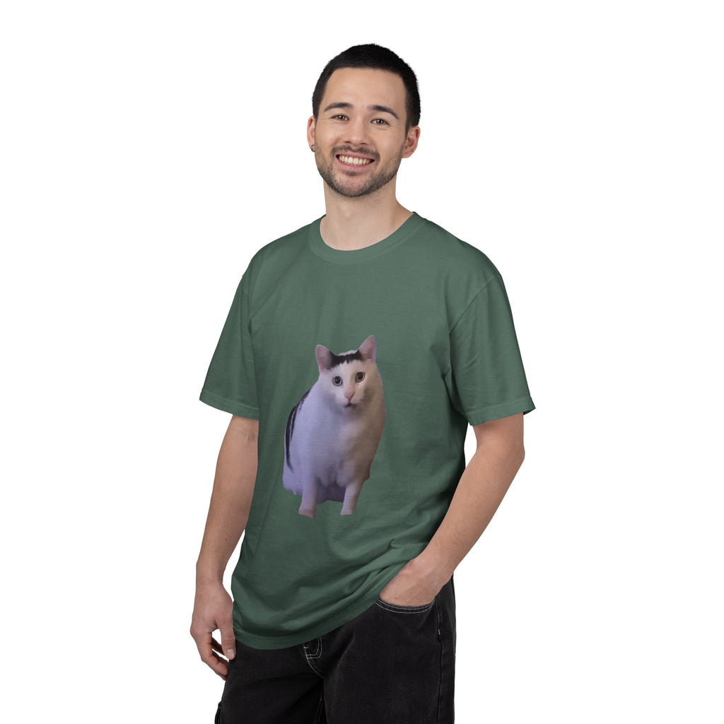 Man wearing a green t-shirt with a cat graphic on a white background