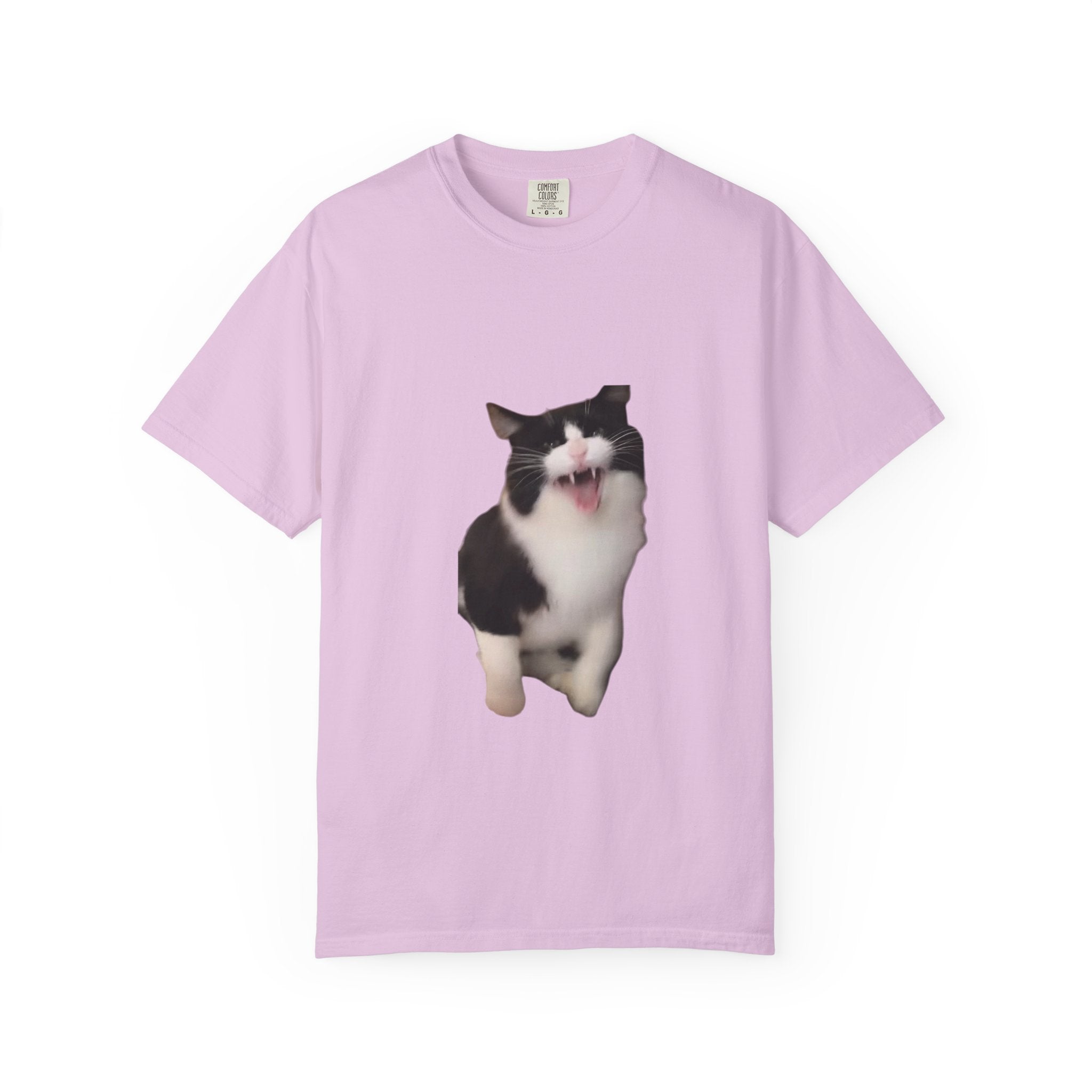 Pink t-shirt with a black and white cat graphic on a white background