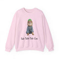 Pink sweatshirt with a cat graphic and text on a white background