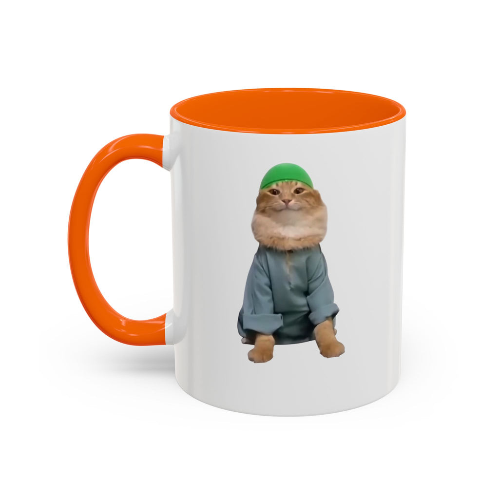 Mug with a cat wearing a green hat and coat on a white background