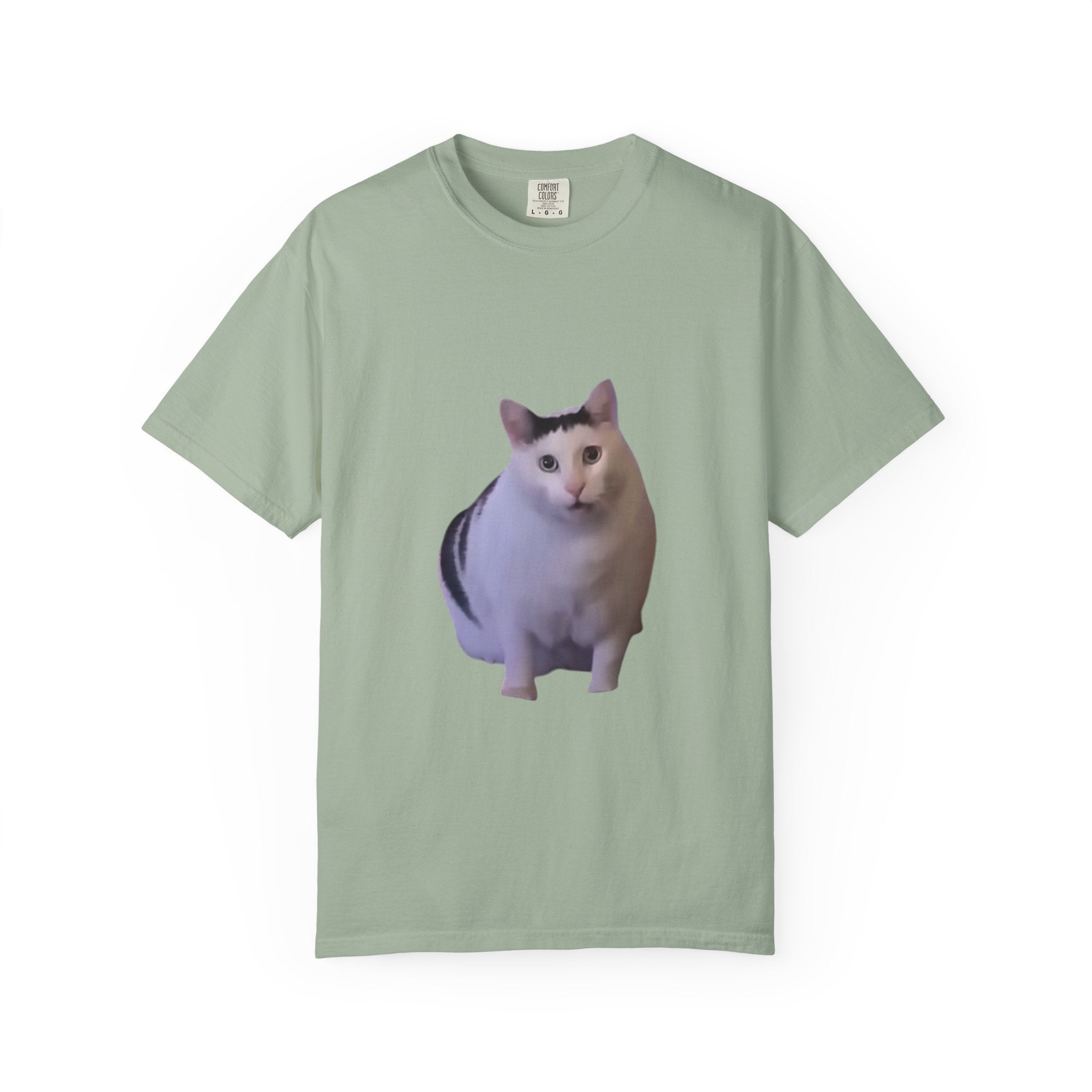Light green t-shirt with a cat print on a white background