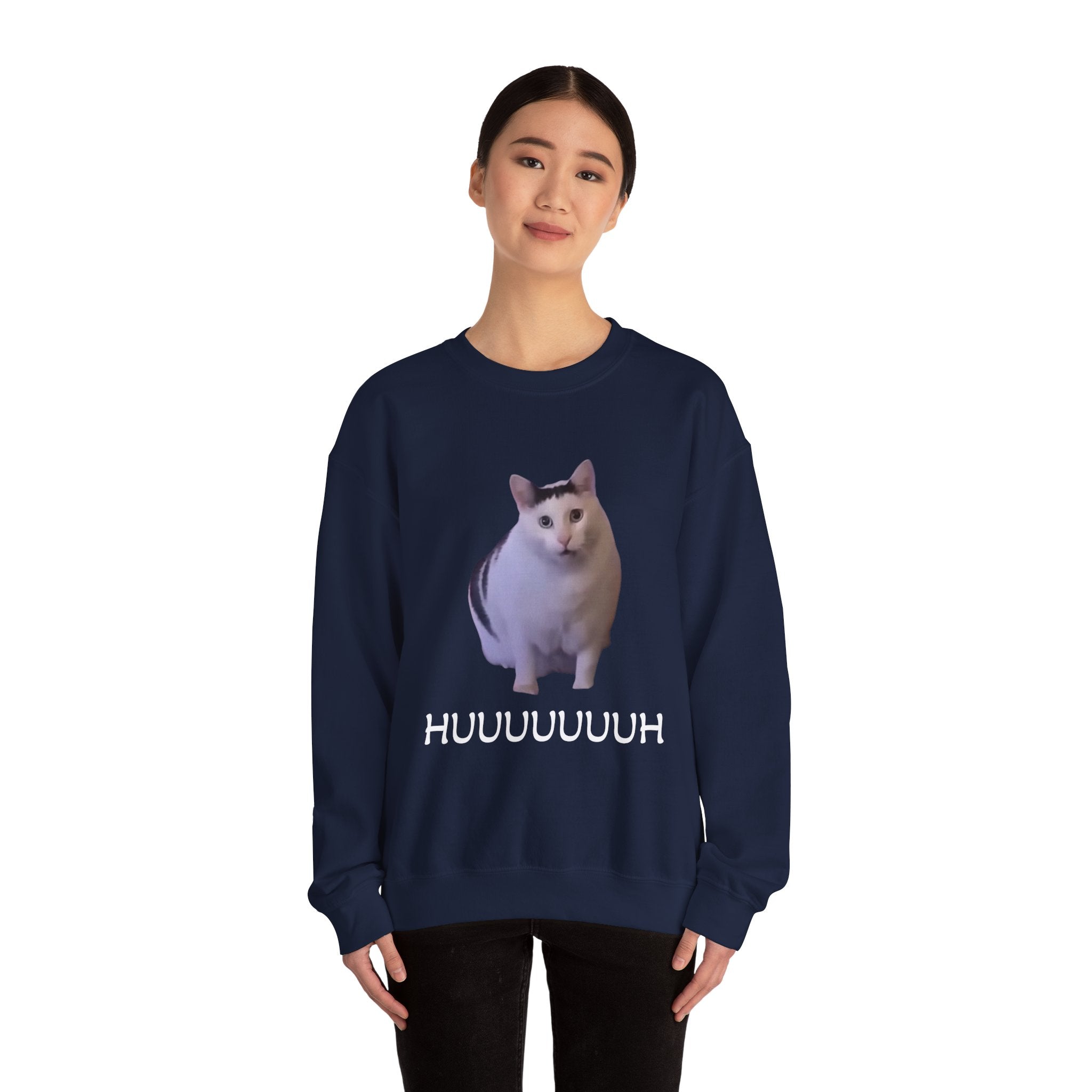 Person wearing a navy blue sweatshirt with a cat graphic and 'HUUUUUUH' text on a white background
