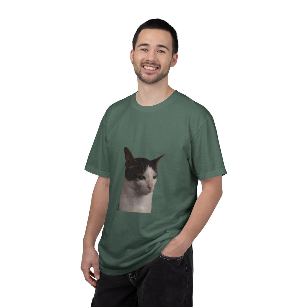 Man wearing a green t-shirt with a cat print on a white background