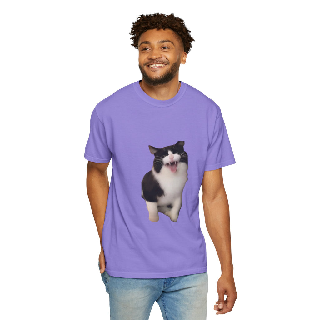 Man wearing a purple t-shirt with a cat graphic on a white background