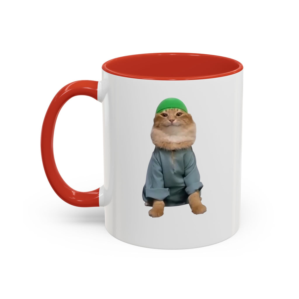Mug with a cat wearing a green hat and coat on a white background