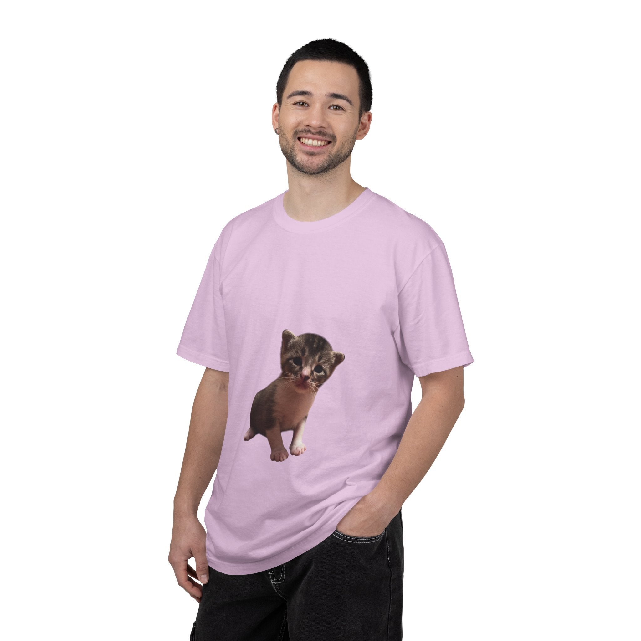 Man wearing a pink t-shirt with a graphic of a small animal on a white background