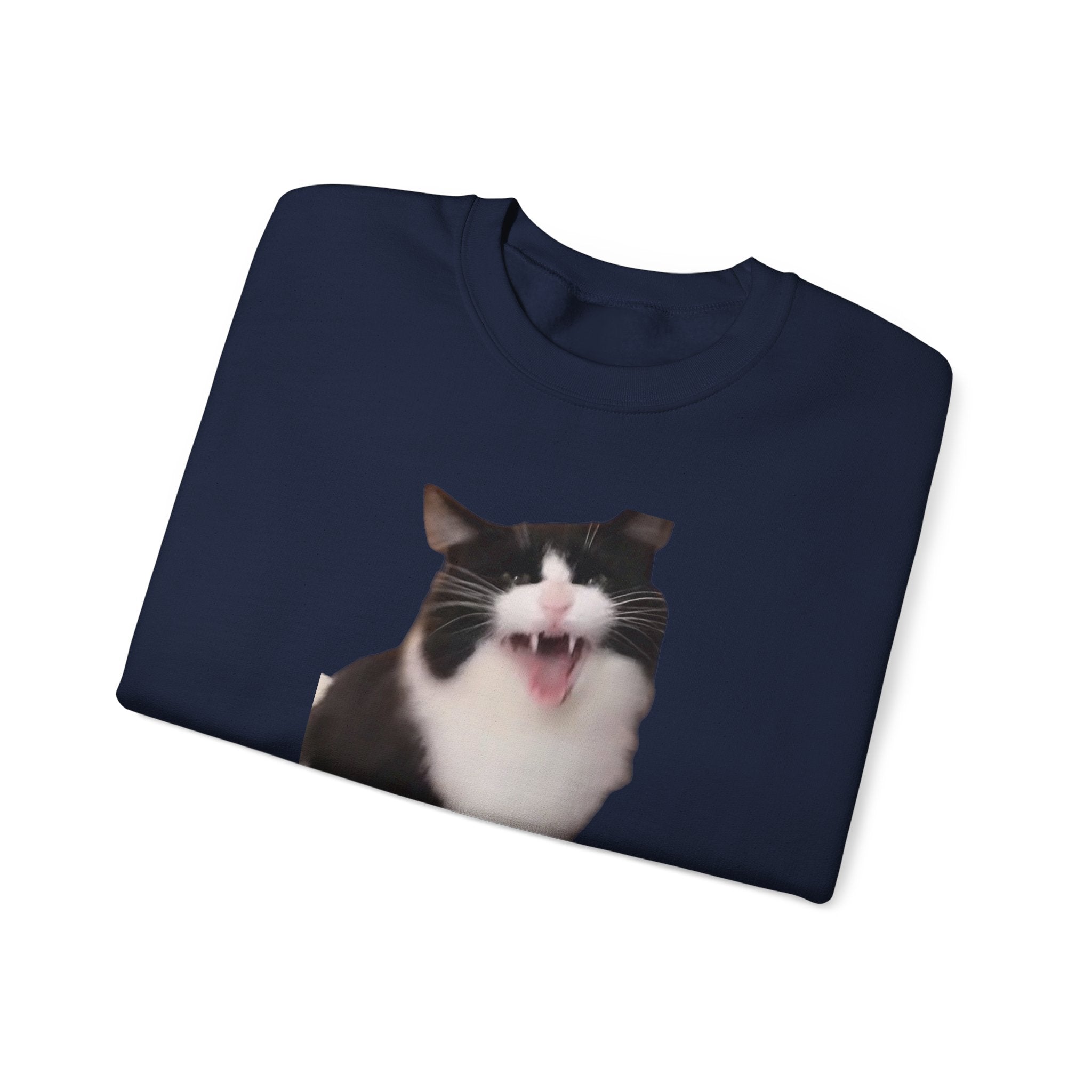 Navy blue t-shirt with a cat's face printed on it, displayed on a white background