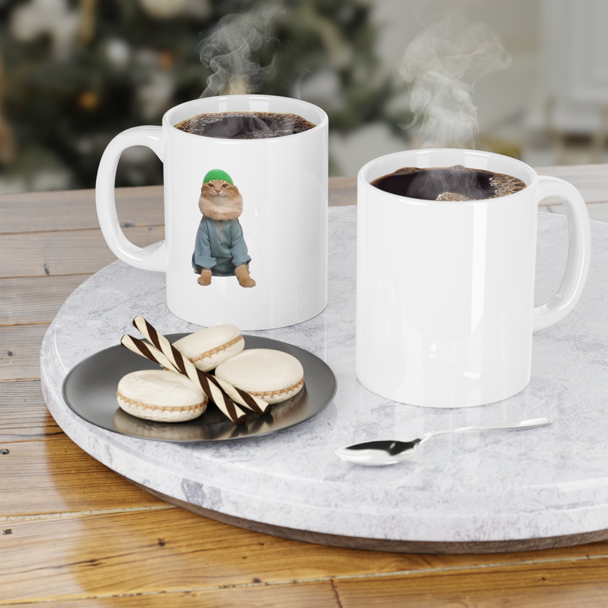 Two white mugs with coffee and a small plate of cookies on a marble tray.