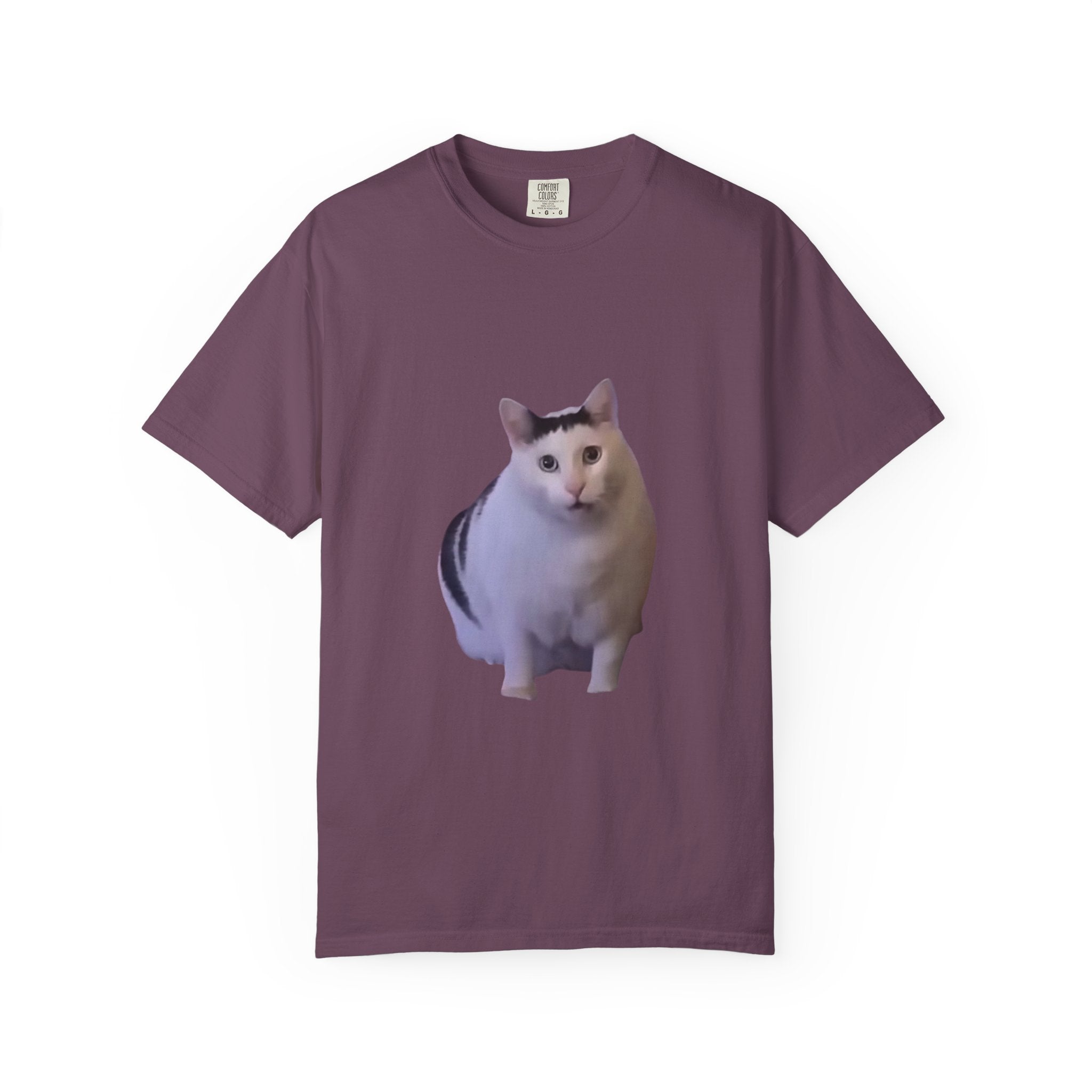 Purple t-shirt with a cat graphic on a white background