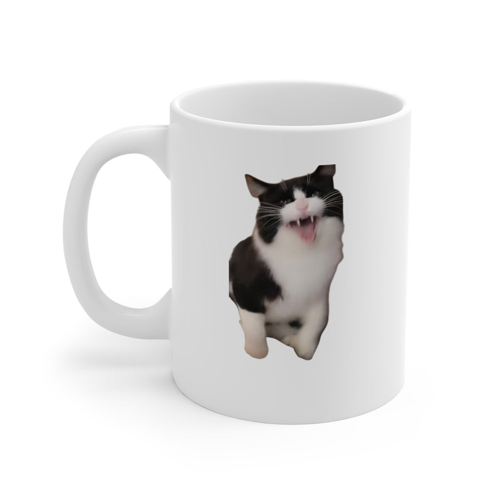 White mug with a black and white cat design on a white background