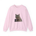 Pink sweatshirt with a cat graphic on a white background