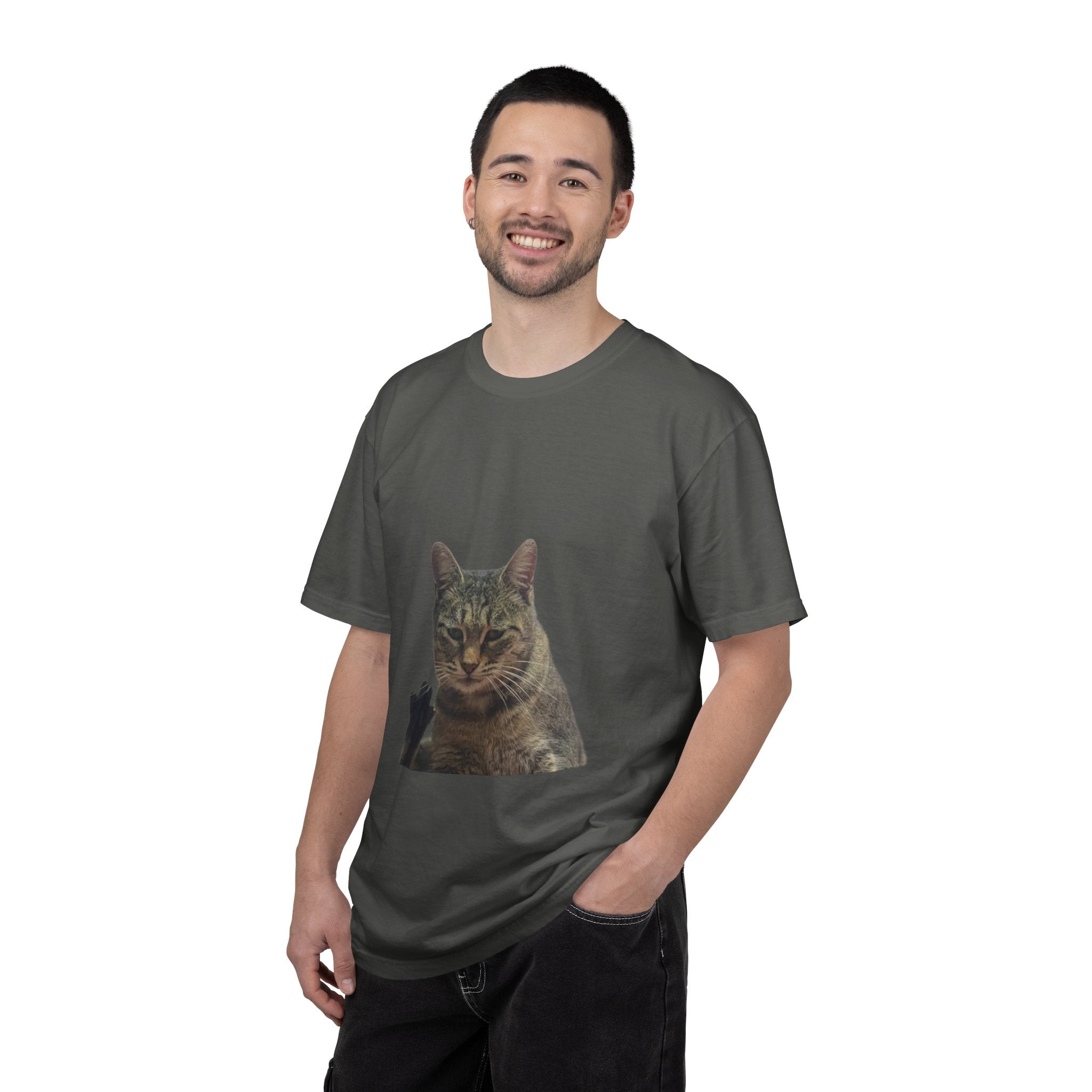 Man wearing a gray t-shirt with a cat graphic on a white background