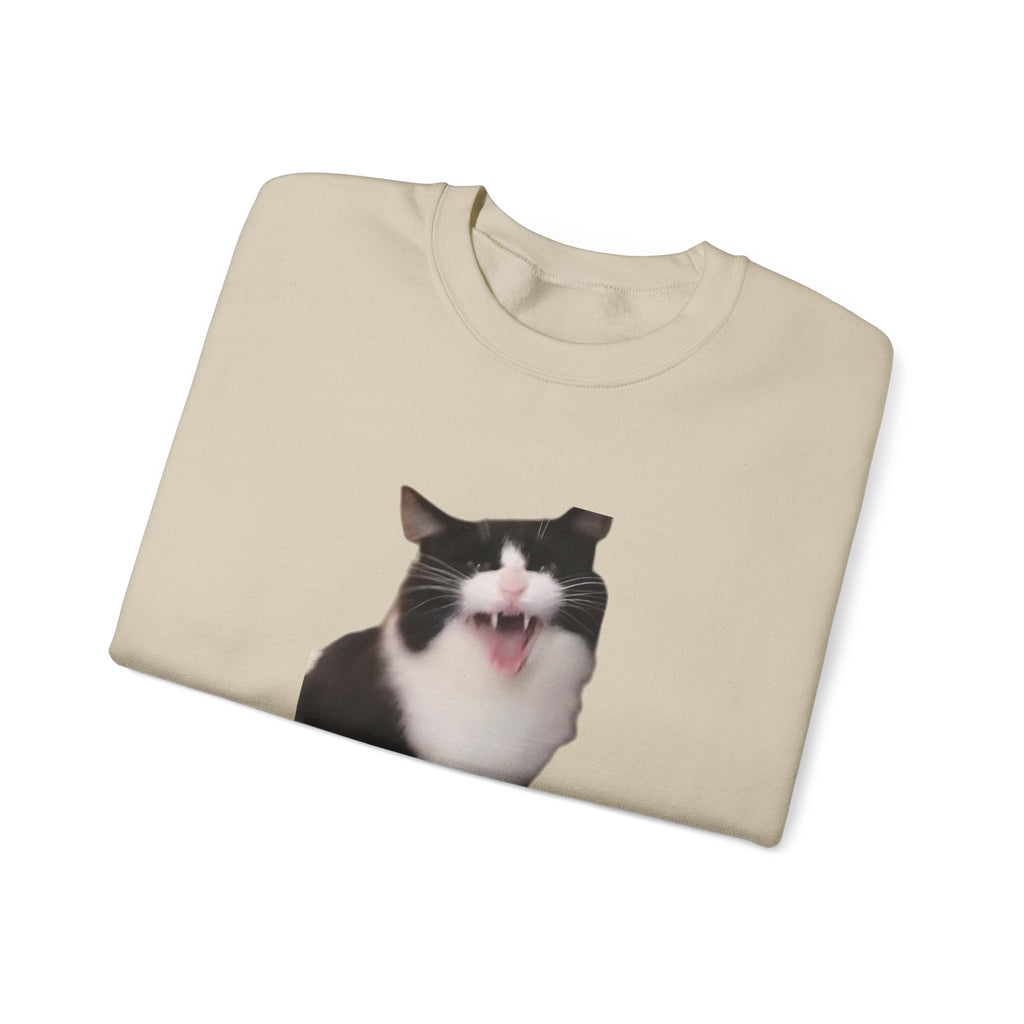 Beige t-shirt with a cat graphic on a white background
