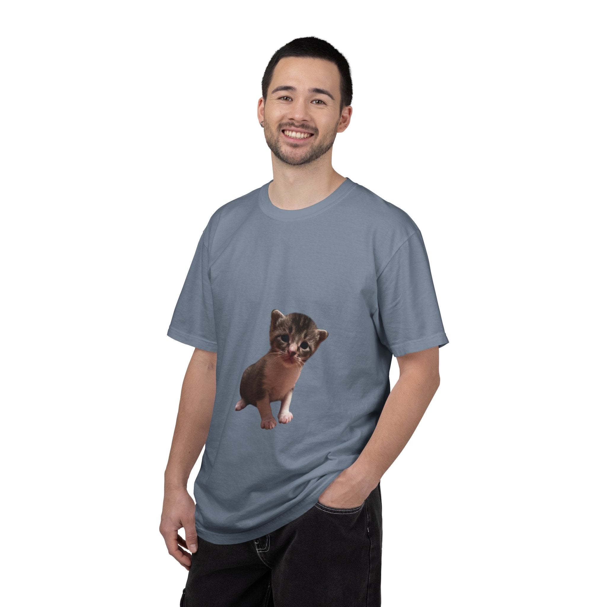 Man wearing a gray t-shirt with a cat graphic on a white background