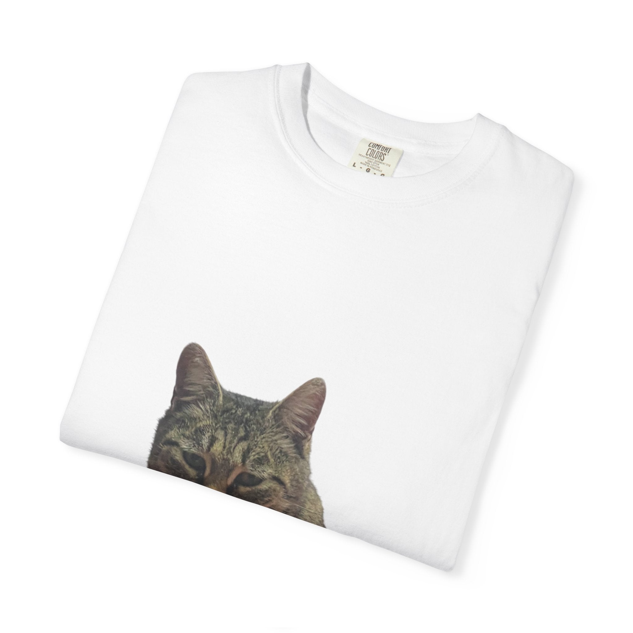 White t-shirt with a cat face print on a white background