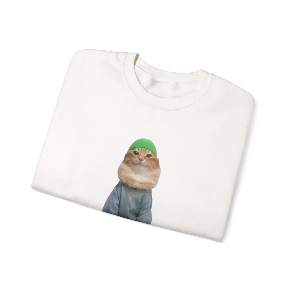 White t-shirt with a printed design of a cat wearing a green beanie on a white background