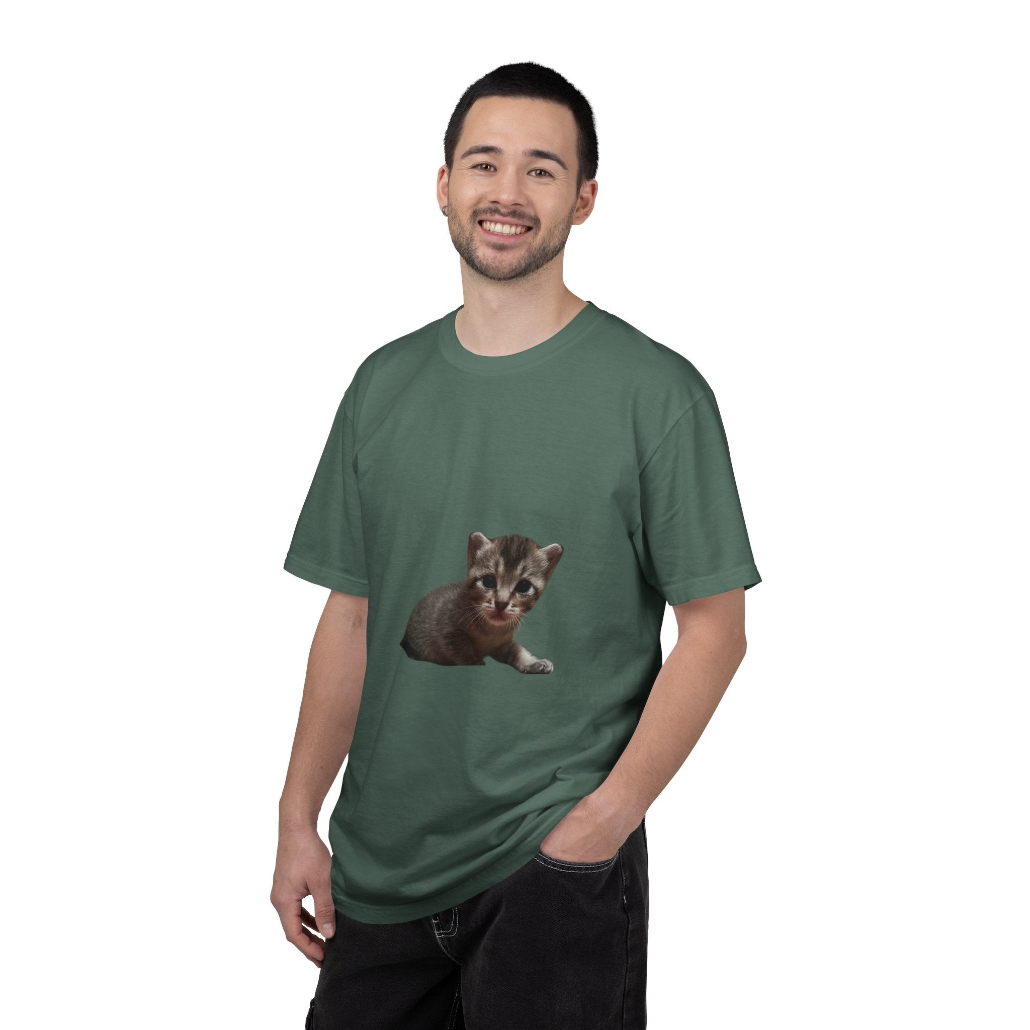 Man wearing a green t-shirt with a kitten graphic on a white background