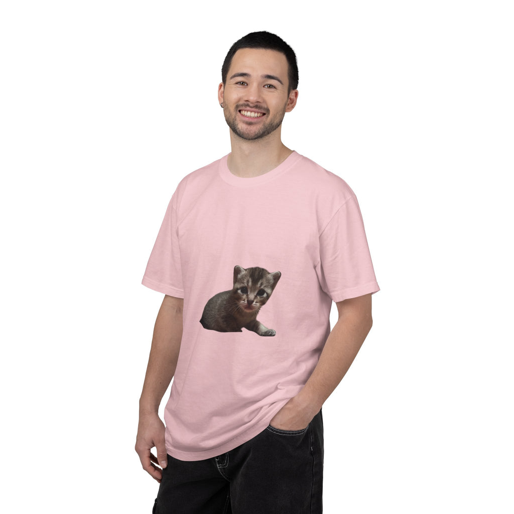 Man wearing a pink t-shirt with a cat graphic on a white background
