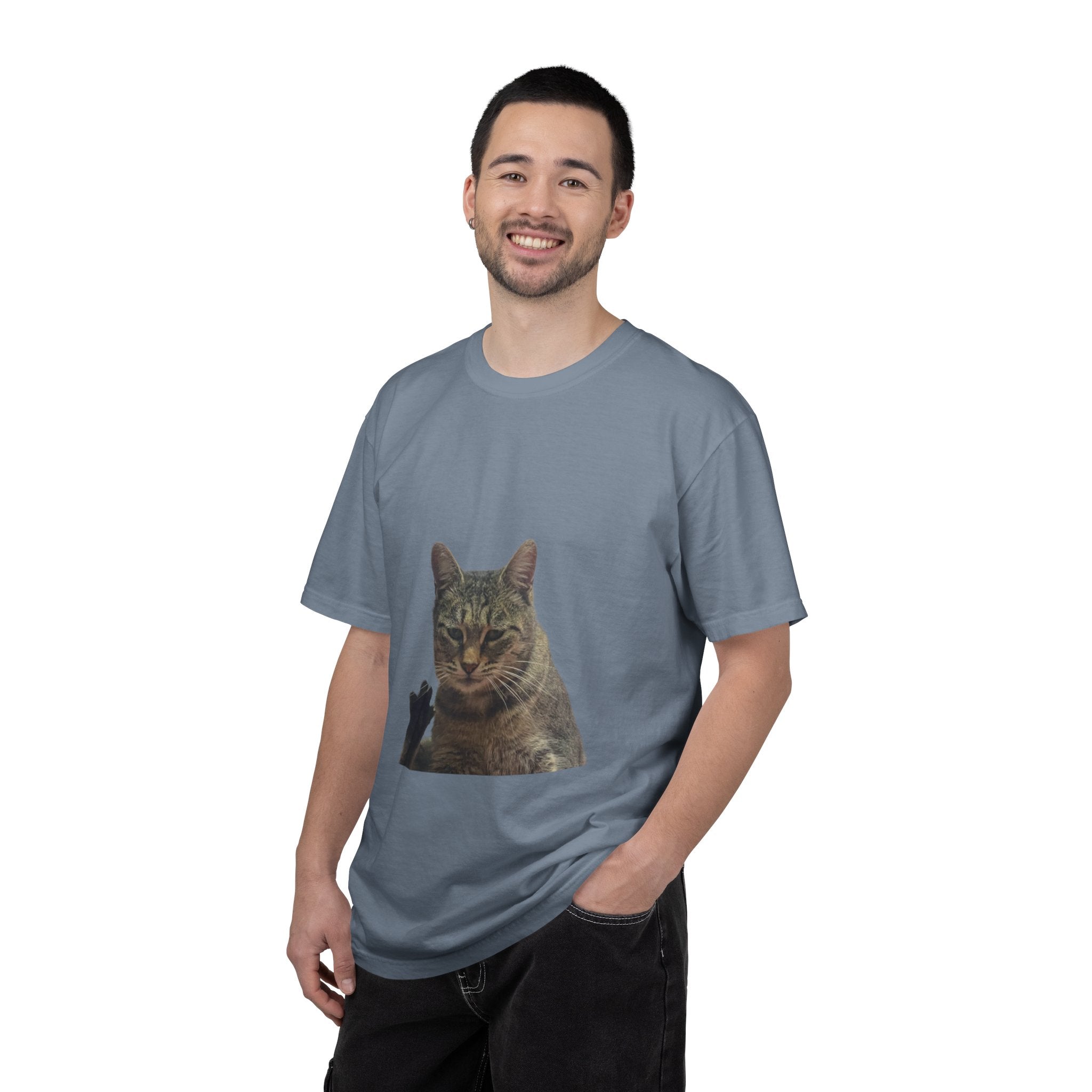 Man wearing a gray t-shirt with a cat graphic on a white background