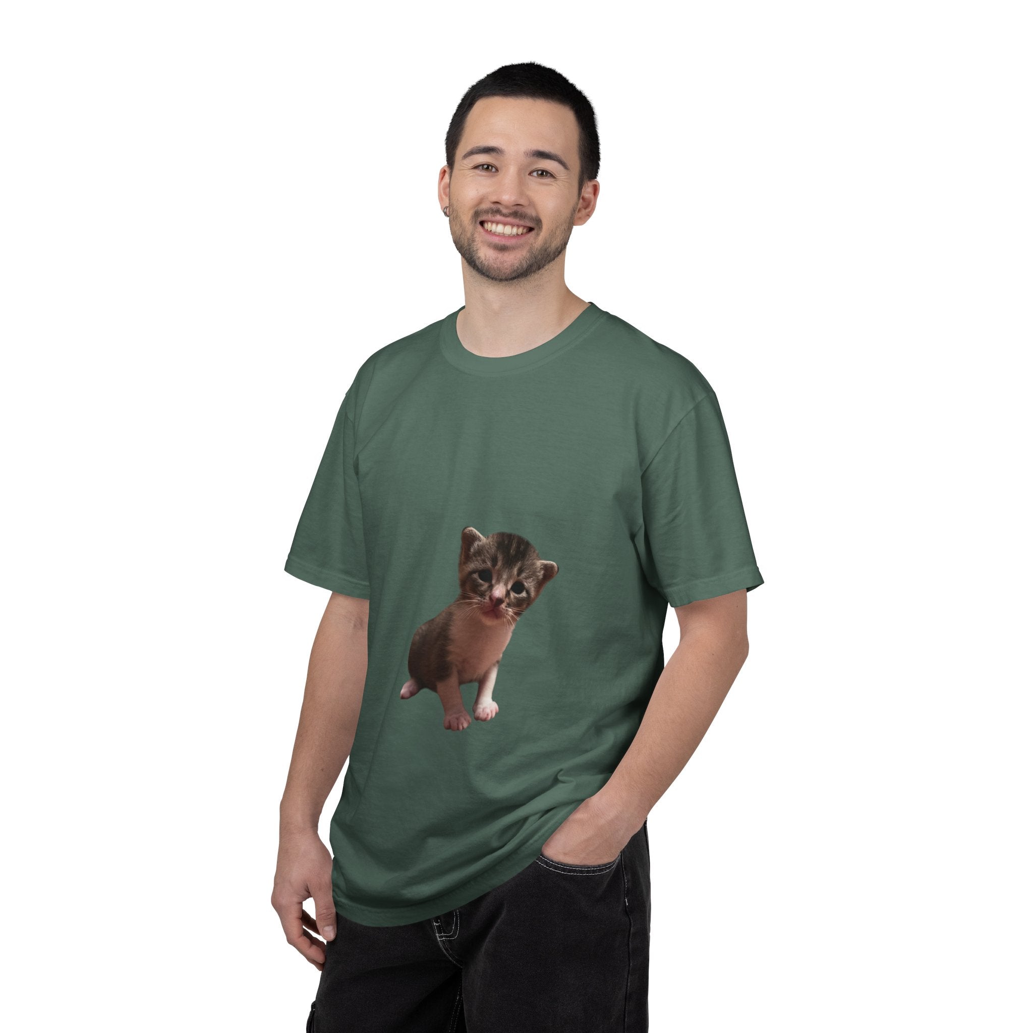 Man wearing a green t-shirt with a cat graphic on a white background