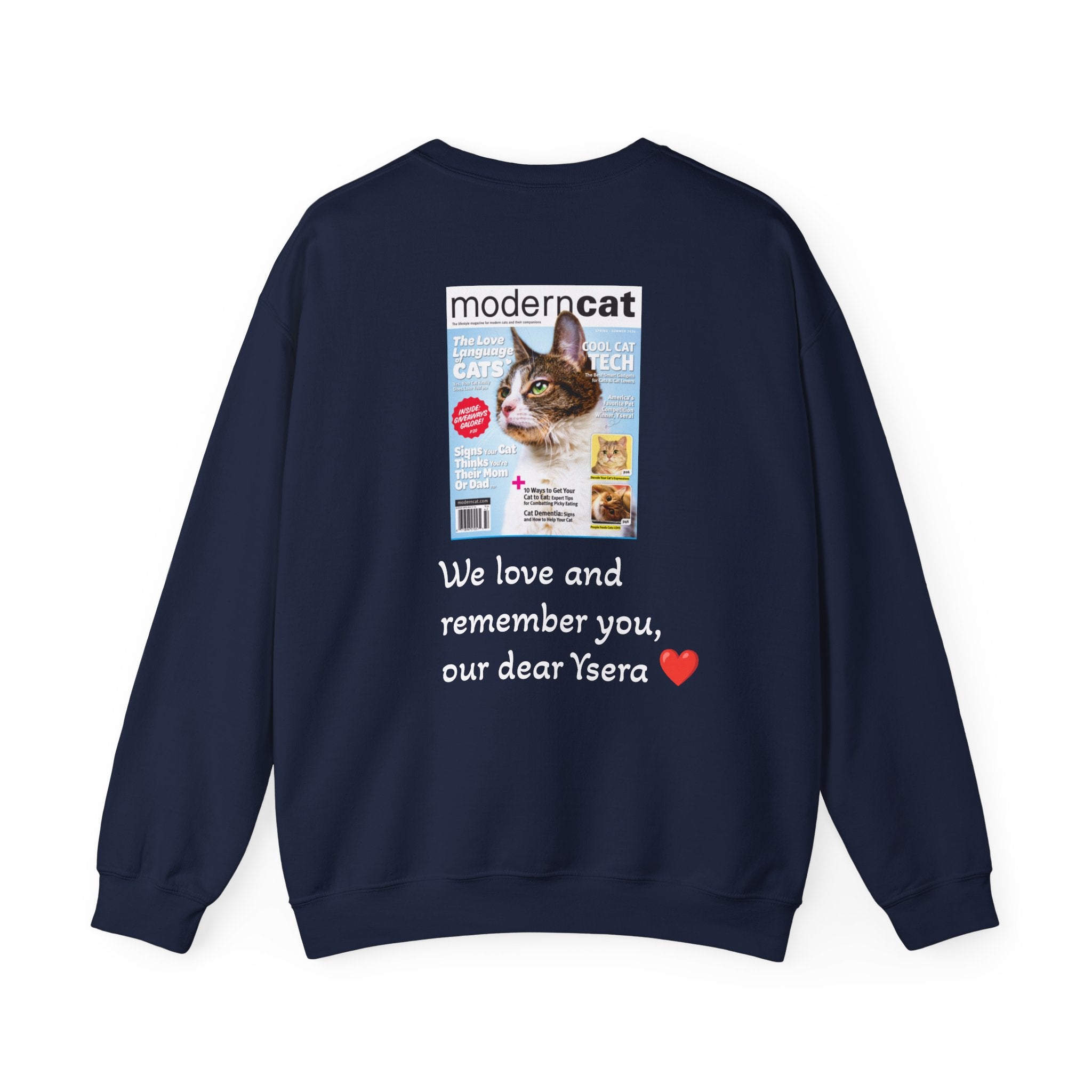 Navy blue sweatshirt with a magazine cover and text on the back, on a white background