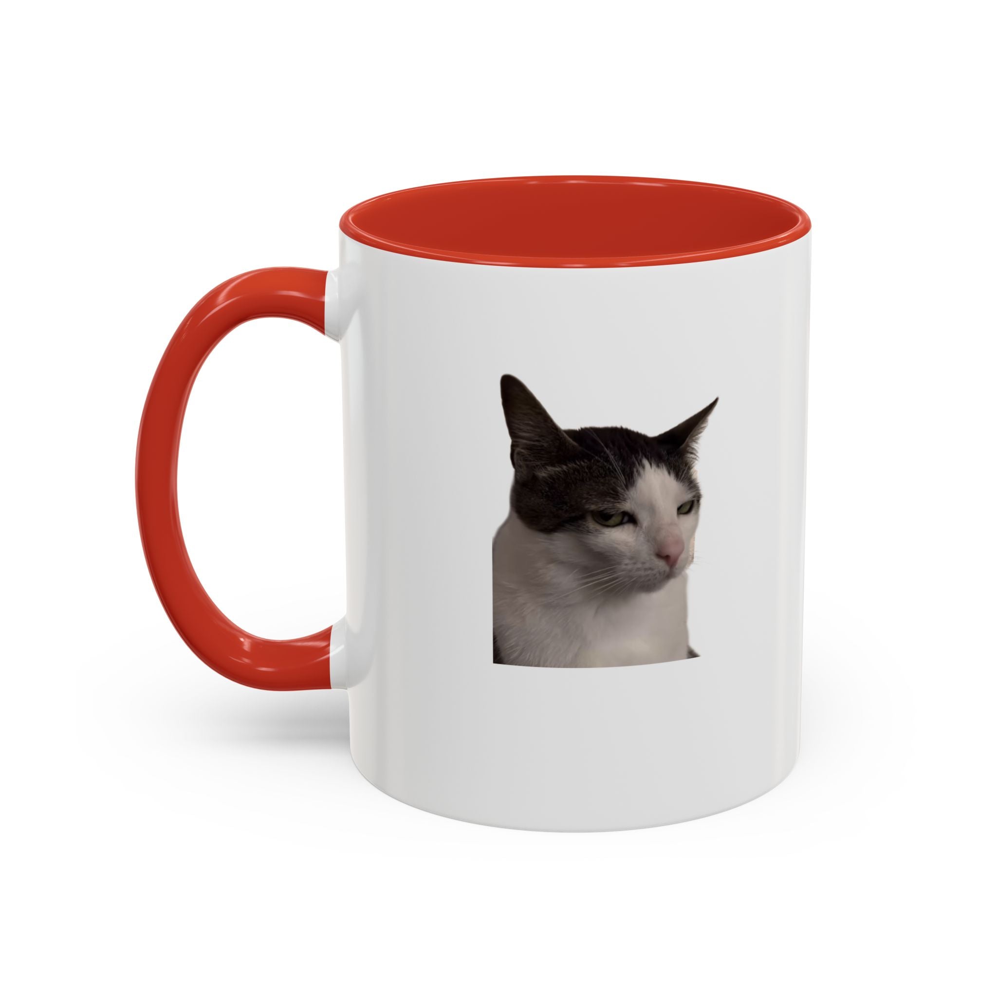 White mug with red interior and handle featuring a cat's face on a white background