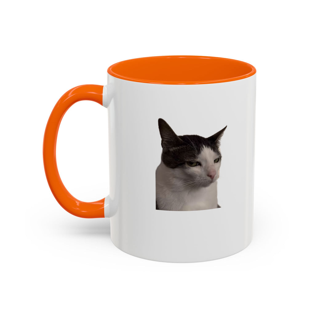 White mug with orange handle and interior, featuring a cat's face on a white background