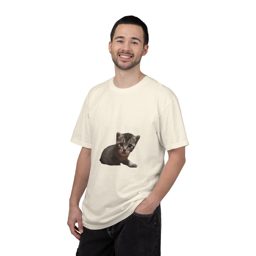 Man wearing a cream t-shirt with a kitten graphic on a white background
