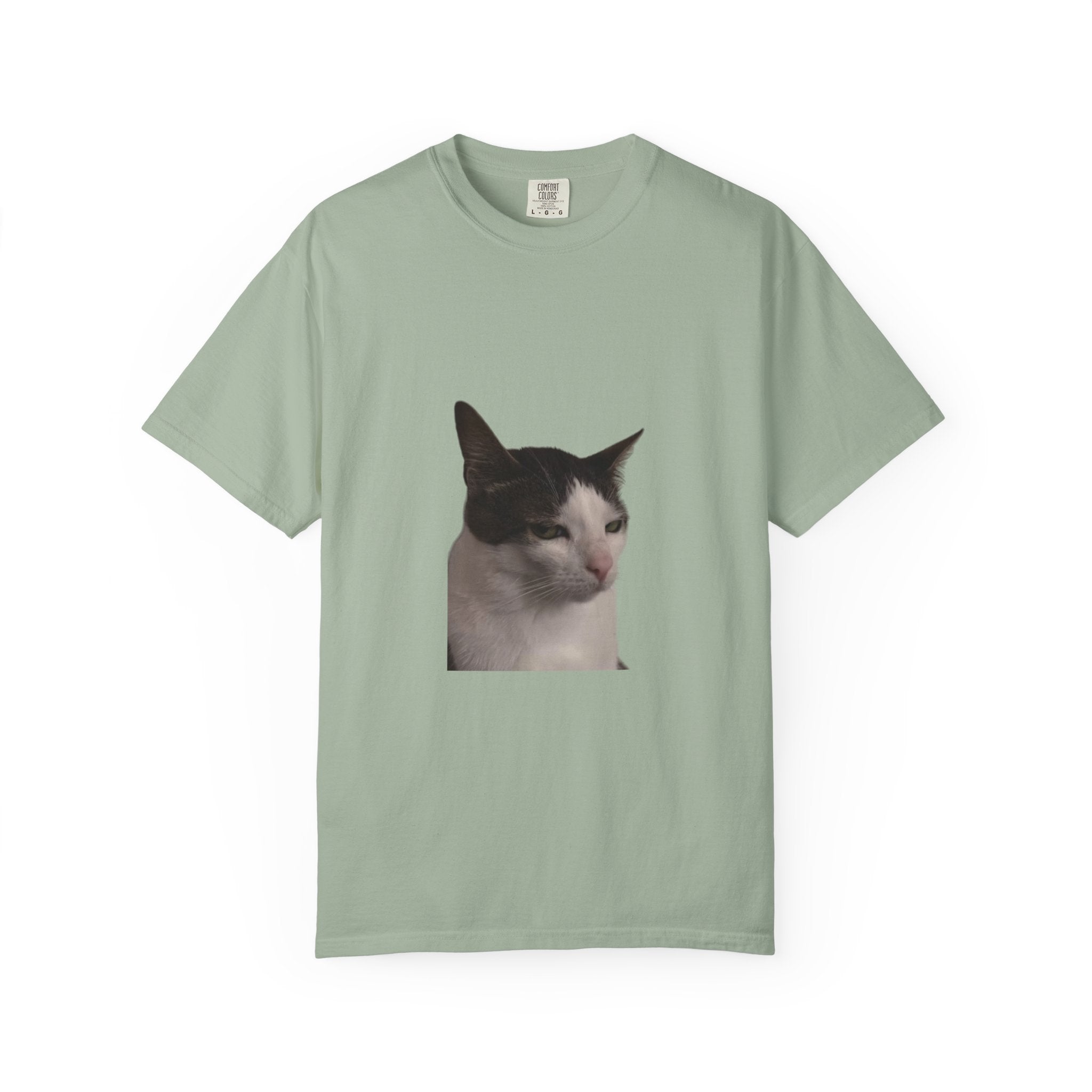 Light green t-shirt with a cat graphic on a white background