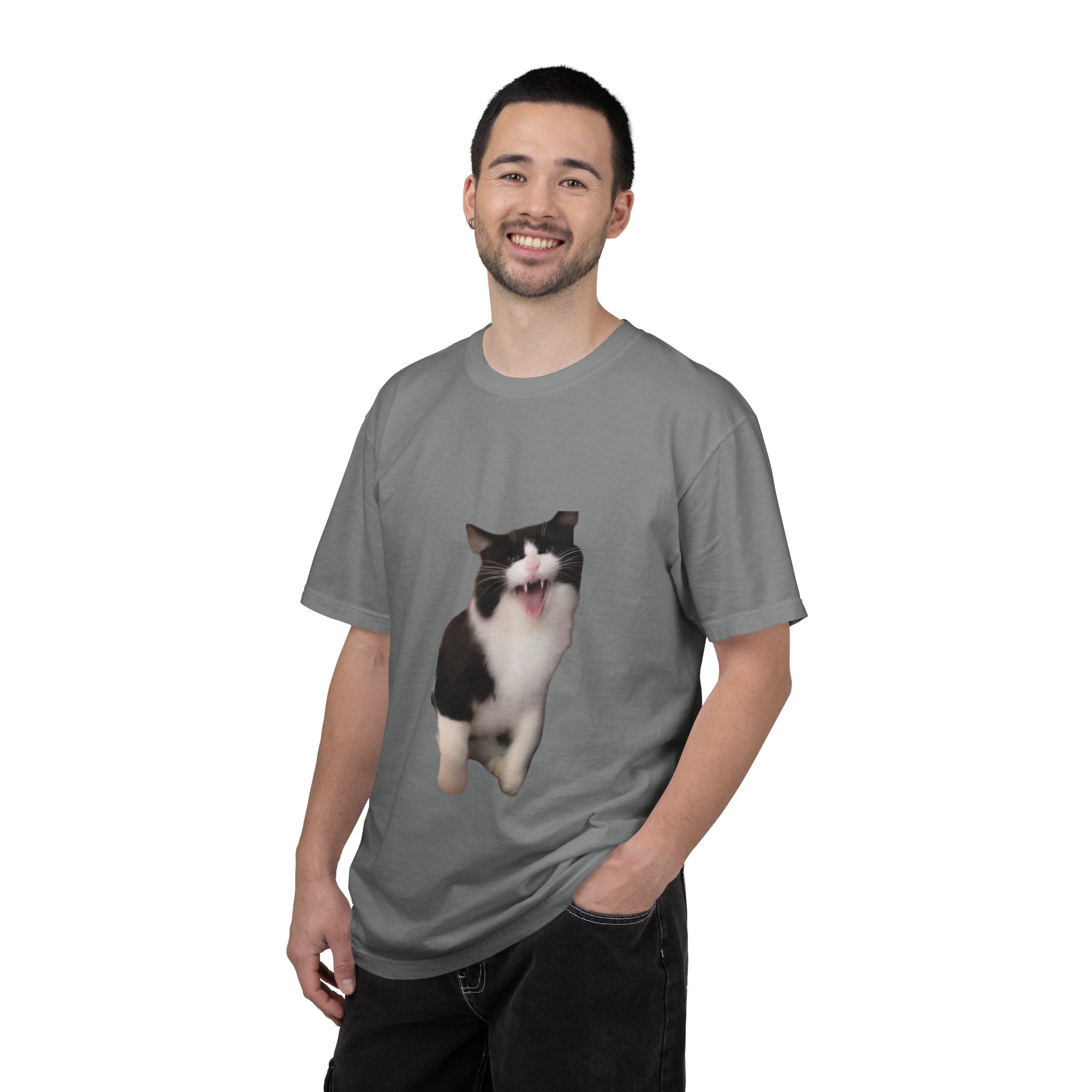 Man wearing a gray t-shirt with a cat graphic on a white background