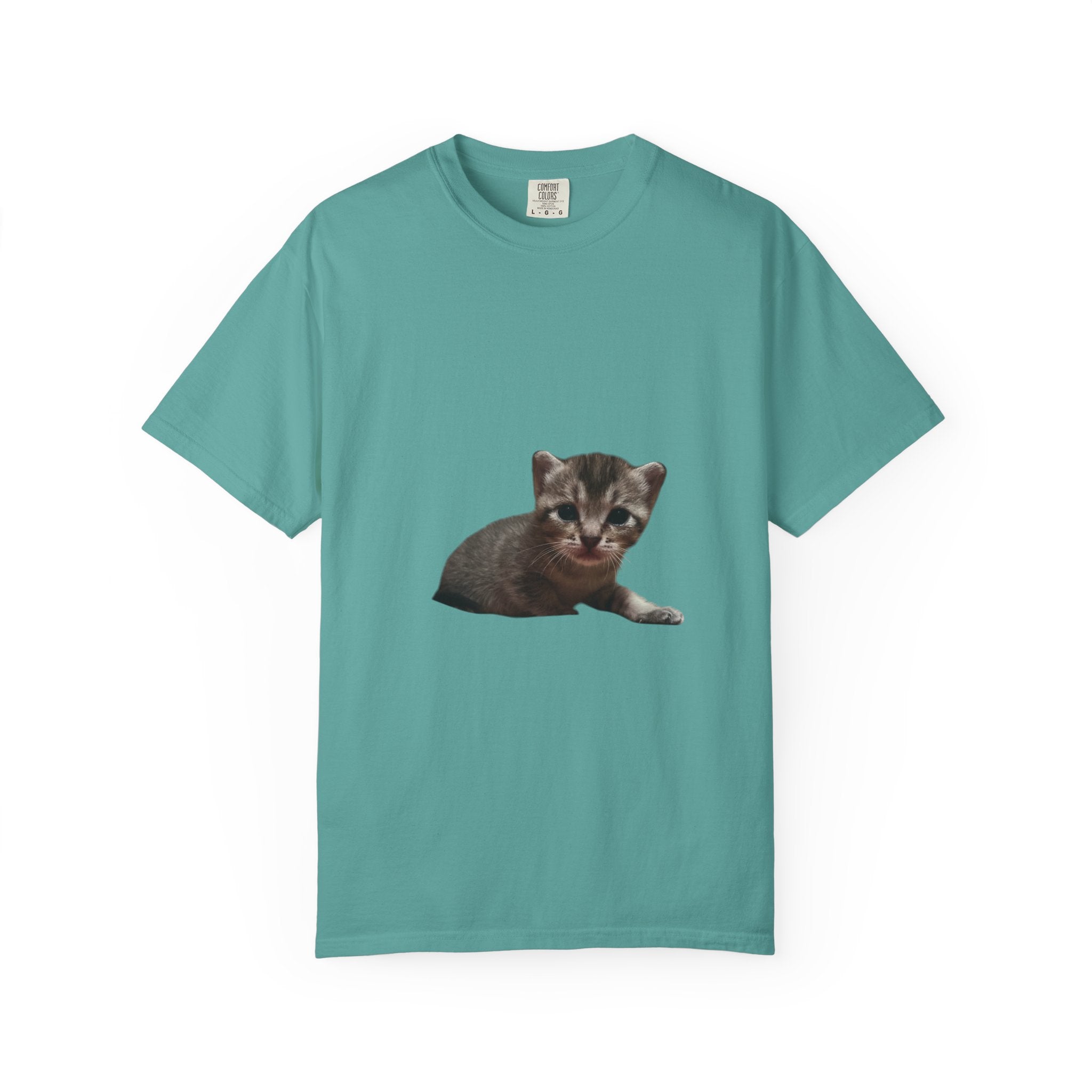 Teal t-shirt with a kitten graphic on a white background