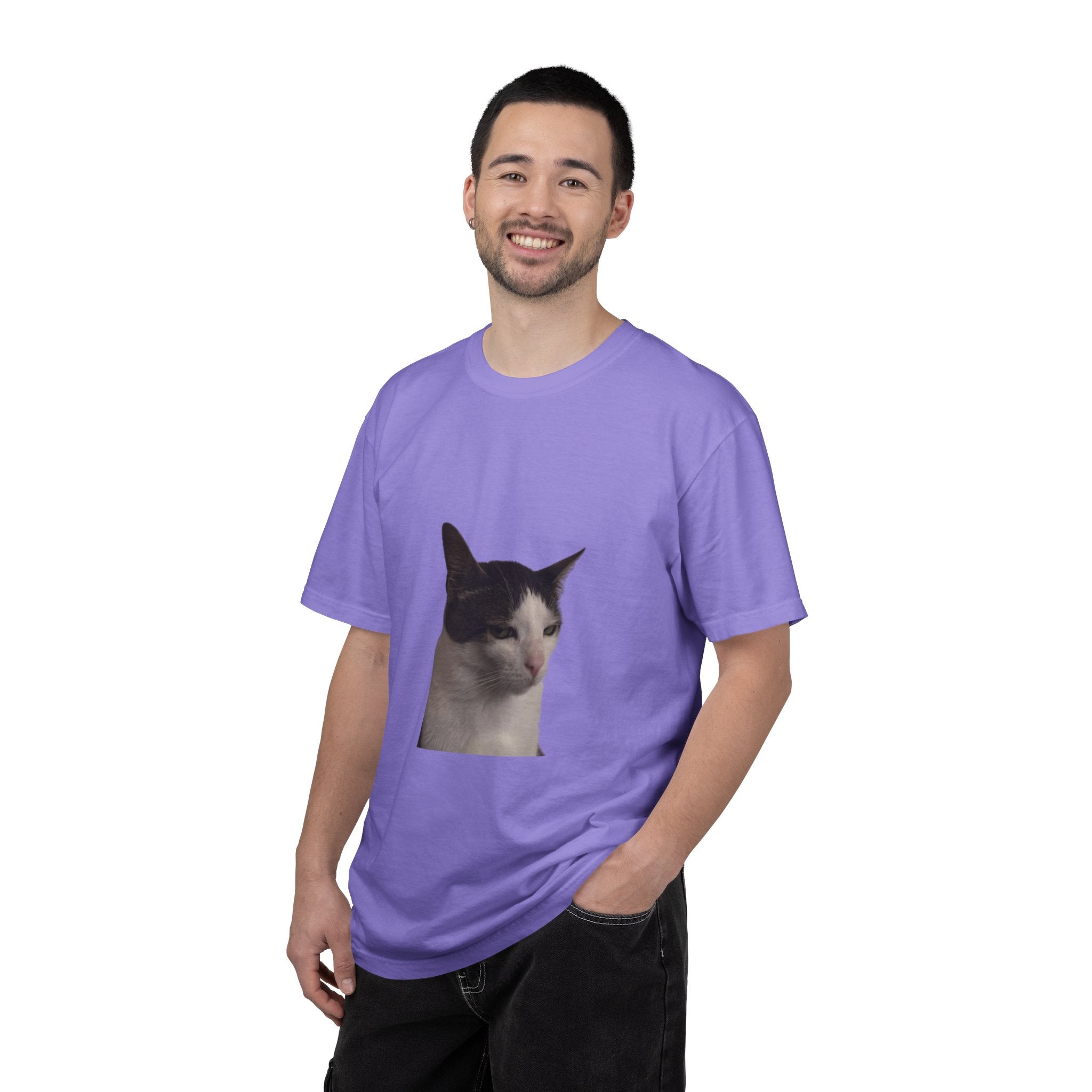 Man wearing a purple t-shirt with a cat graphic on a white background