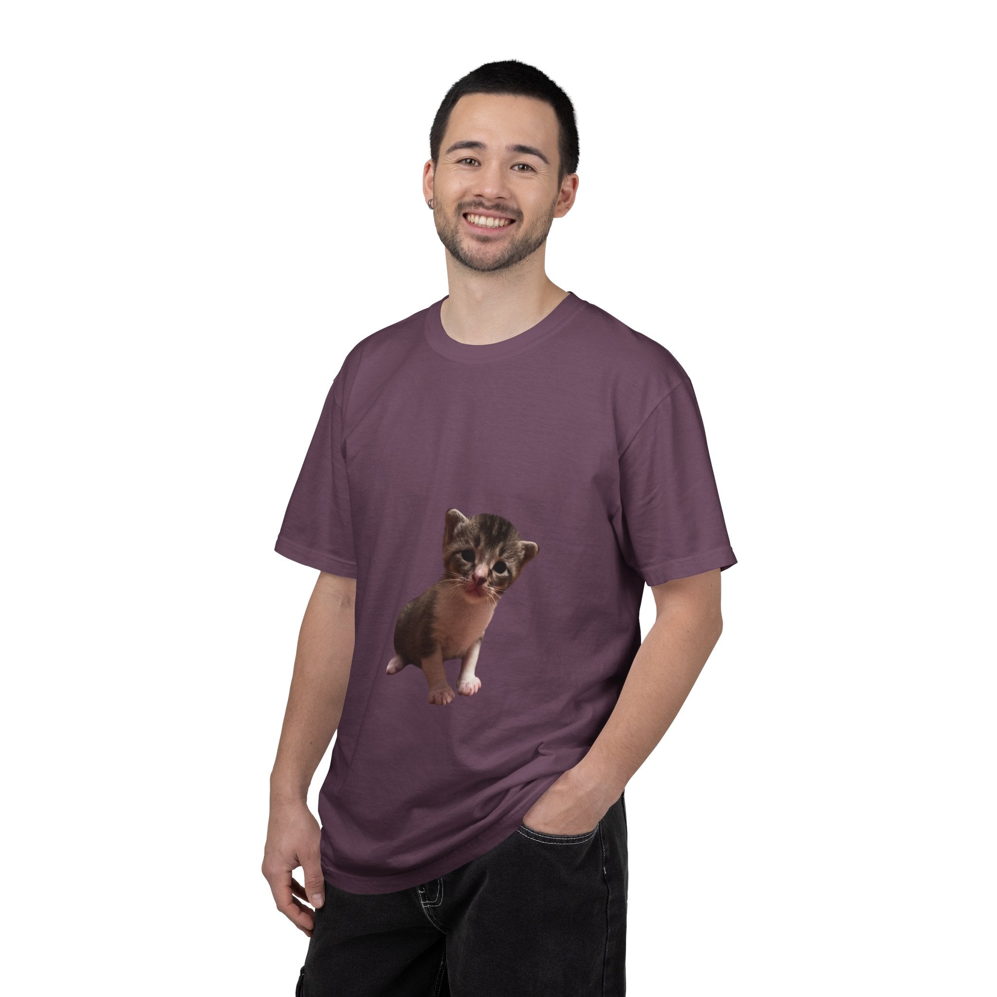 Man wearing a purple t-shirt with a graphic of a small animal on a white background