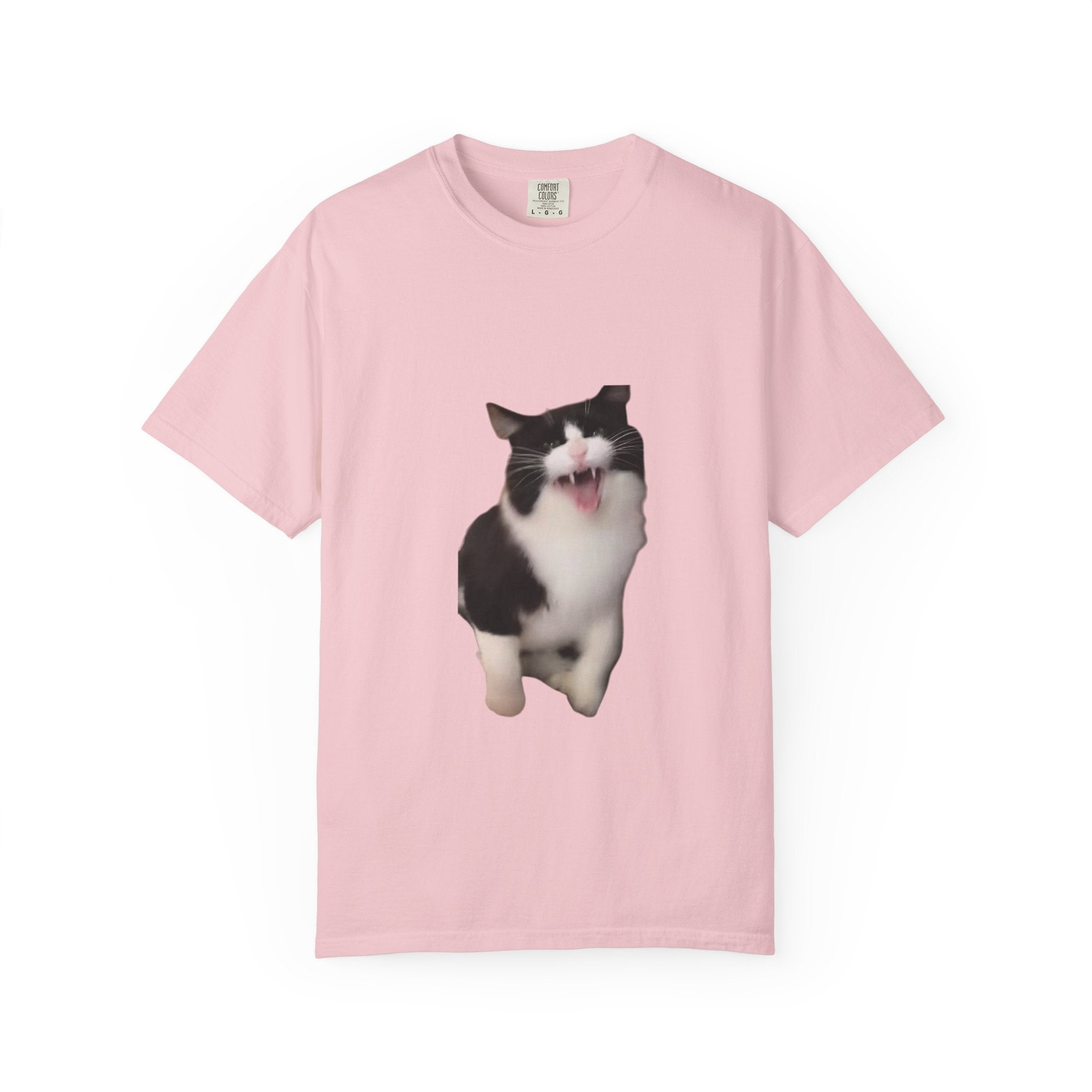 Pink t-shirt with a black and white cat graphic on a white background