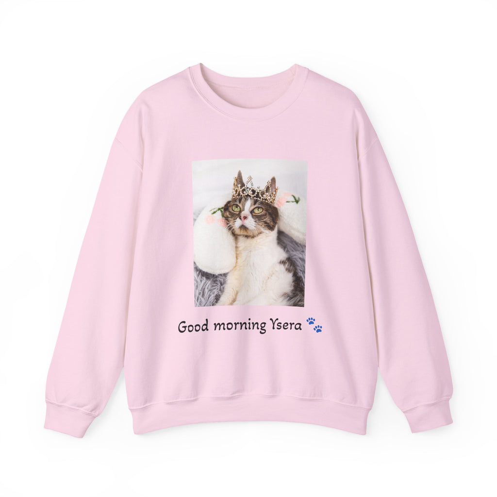Pink sweatshirt with a cat graphic and text 'Good morning Ysera' on a white background