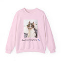 Pink sweatshirt with a cat graphic and text 'Good morning Ysera' on a white background