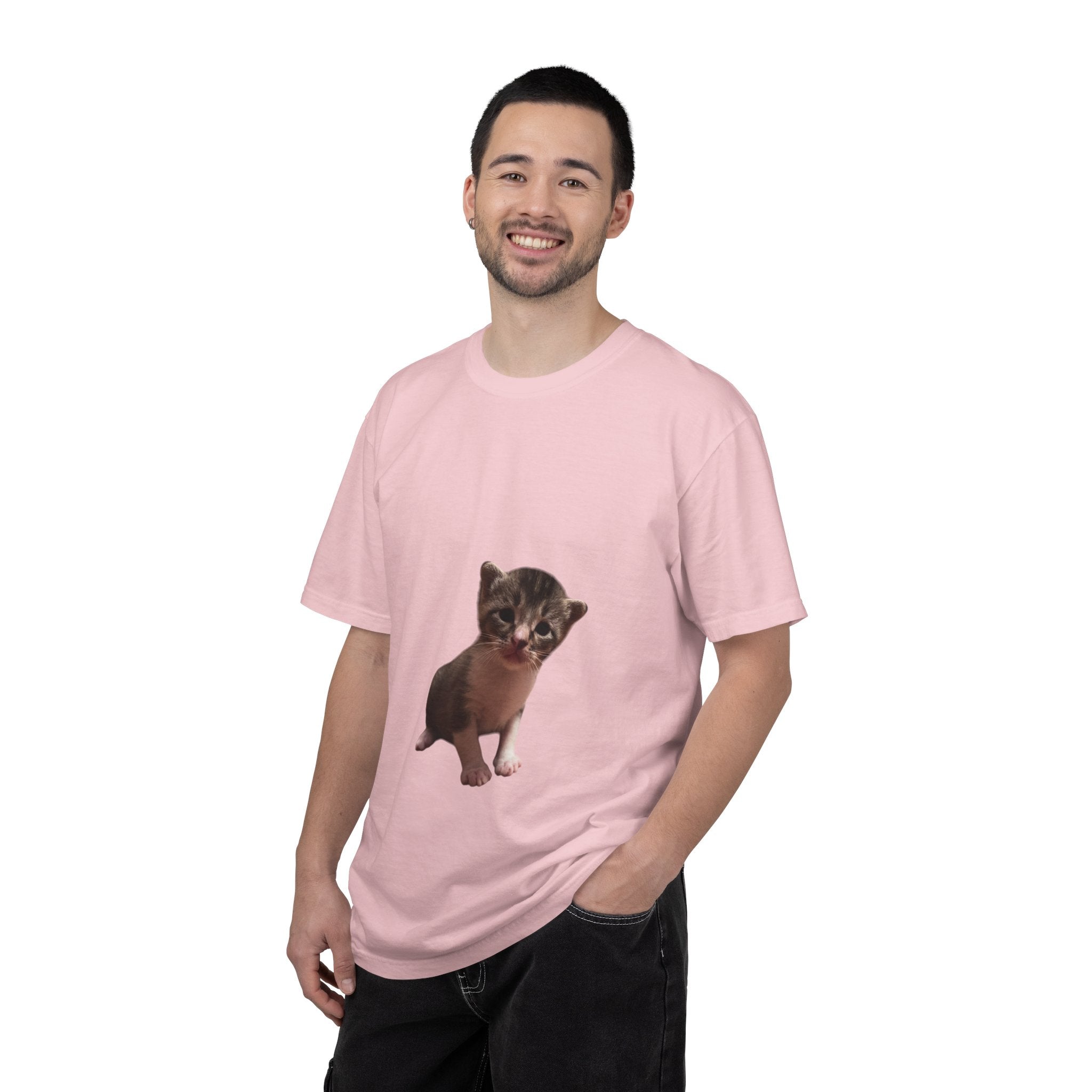 Man wearing a pink t-shirt with a graphic of a small animal on a white background