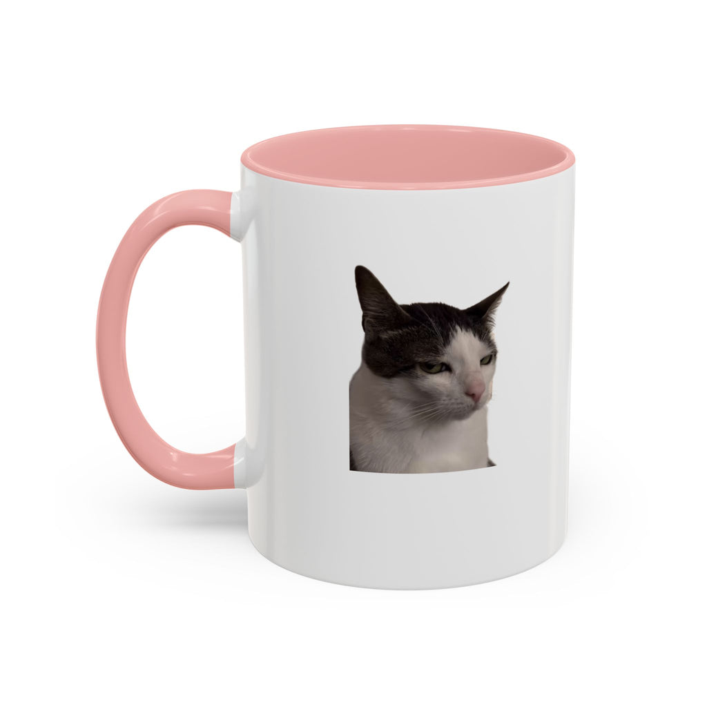 White mug with pink interior and handle featuring a cat's face on a white background