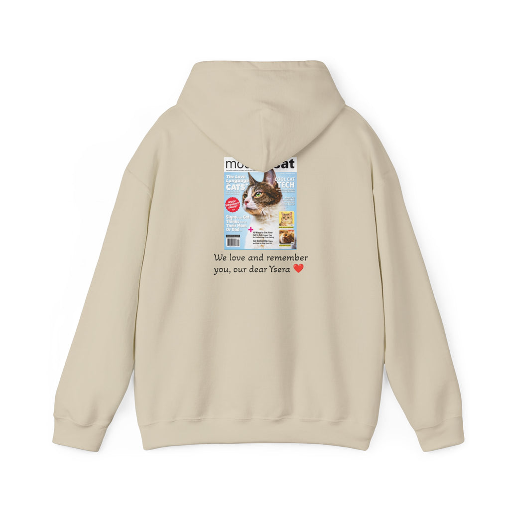 Beige hoodie with a magazine cover featuring a cat on the back